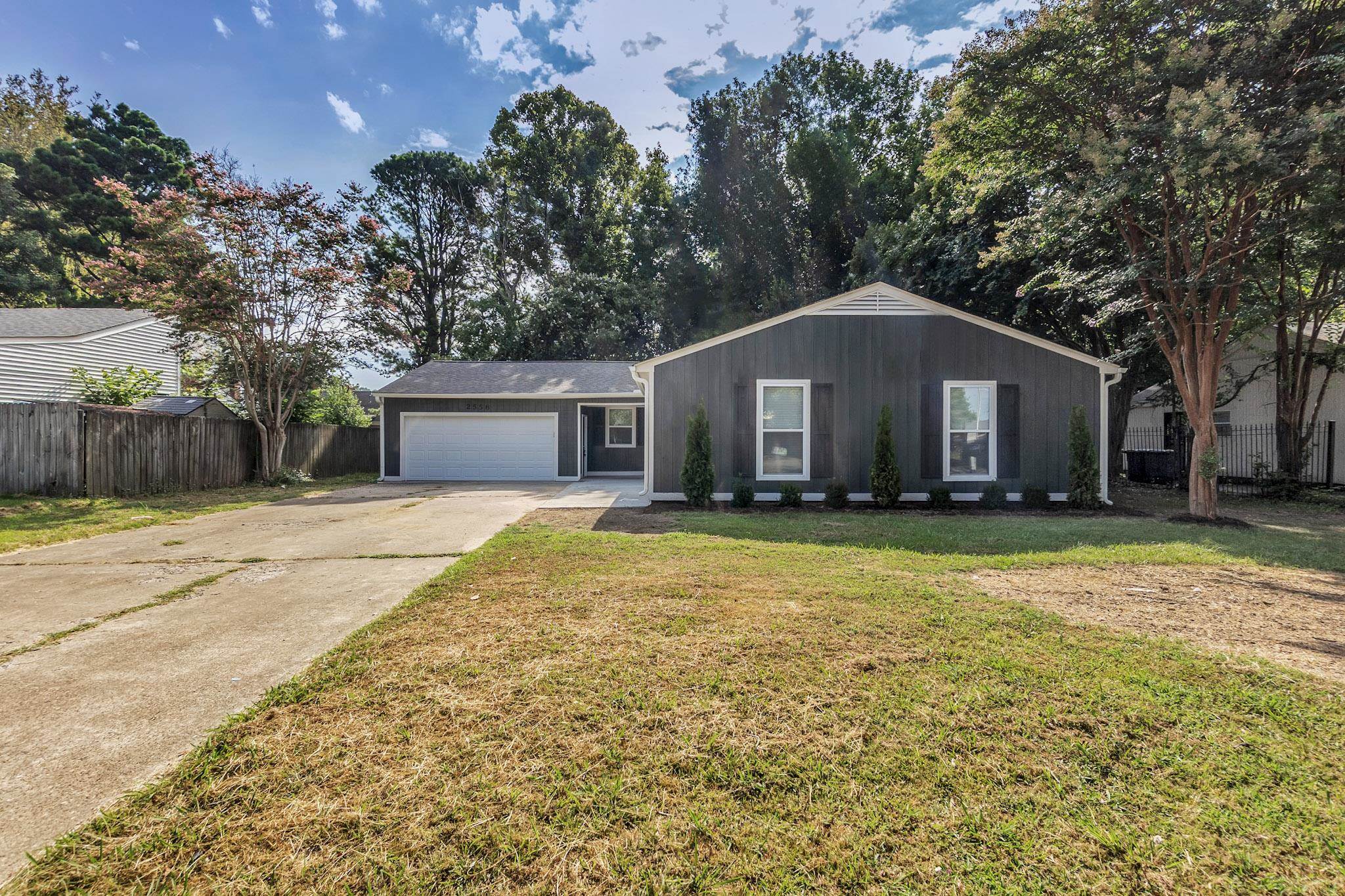 2556 Lynnfield Road Memphis, TN 38119 - Photo 11 of 24 View of front of home with a garage and concrete driveway
