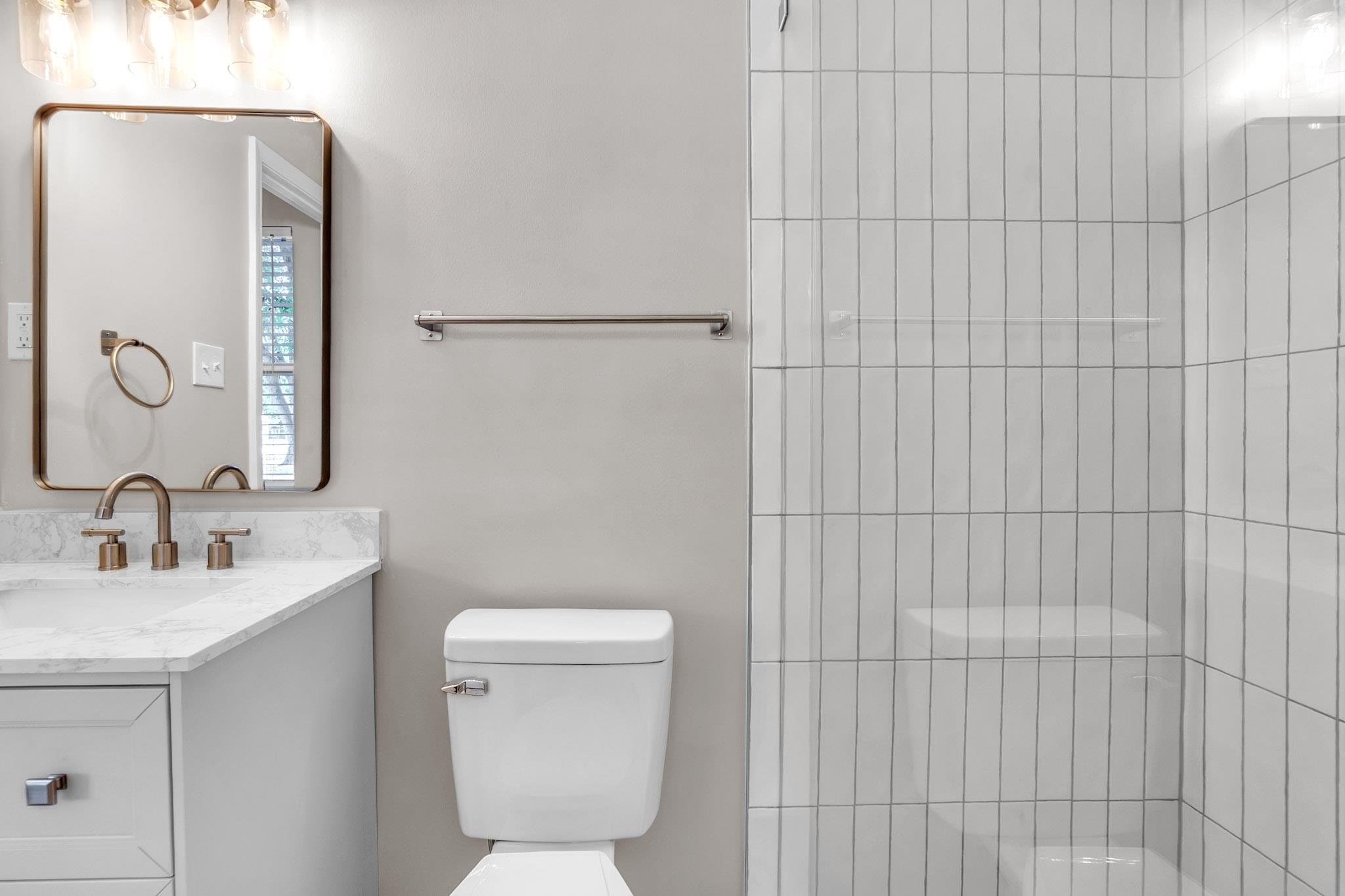 2556 Lynnfield Road Memphis, TN 38119 - Photo 6 of 24 Bathroom featuring vanity and a shower