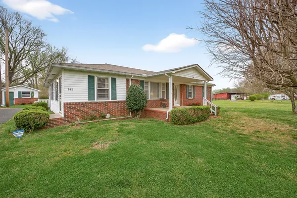 a view of outdoor space yard and front view of a house