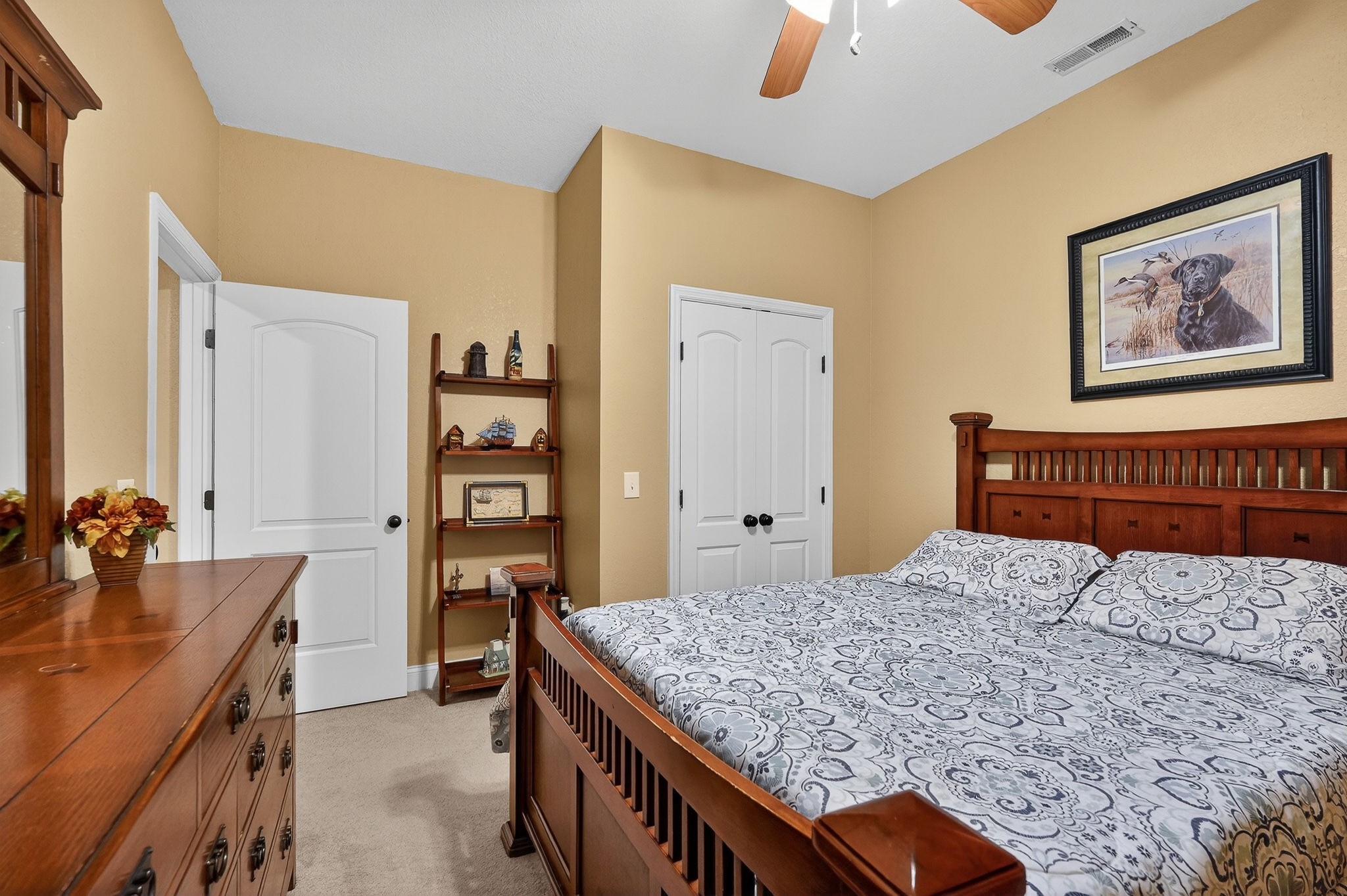 933 John Henry Lewis Road Dunlap, TN 37327 - Photo 44 of 100 a bedroom with a bed and a dresser in it