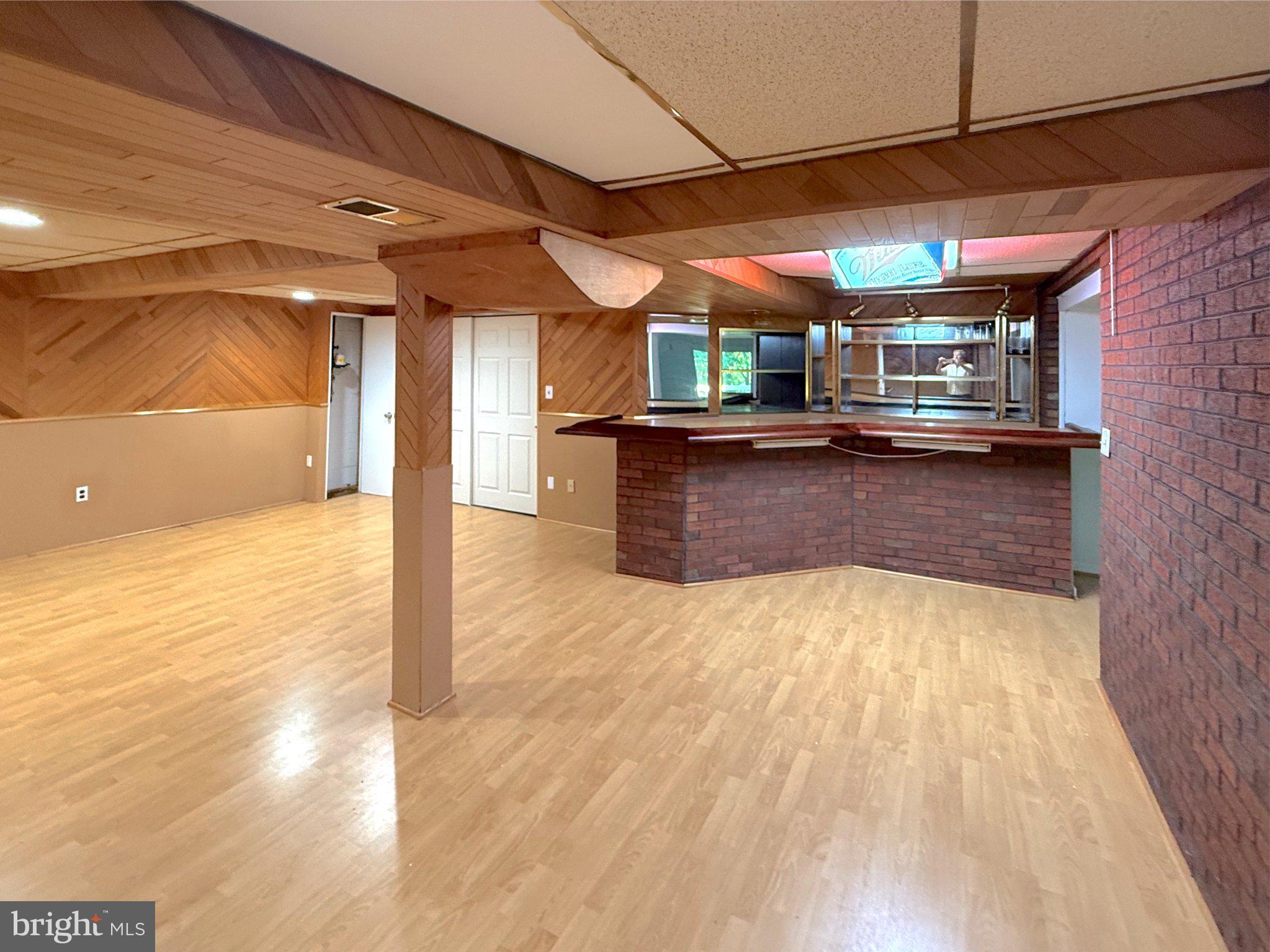 9006 Sidehill Road Ellicott City, MD 21042 - Photo 41 of 53 Spacious basement with rustic charm.