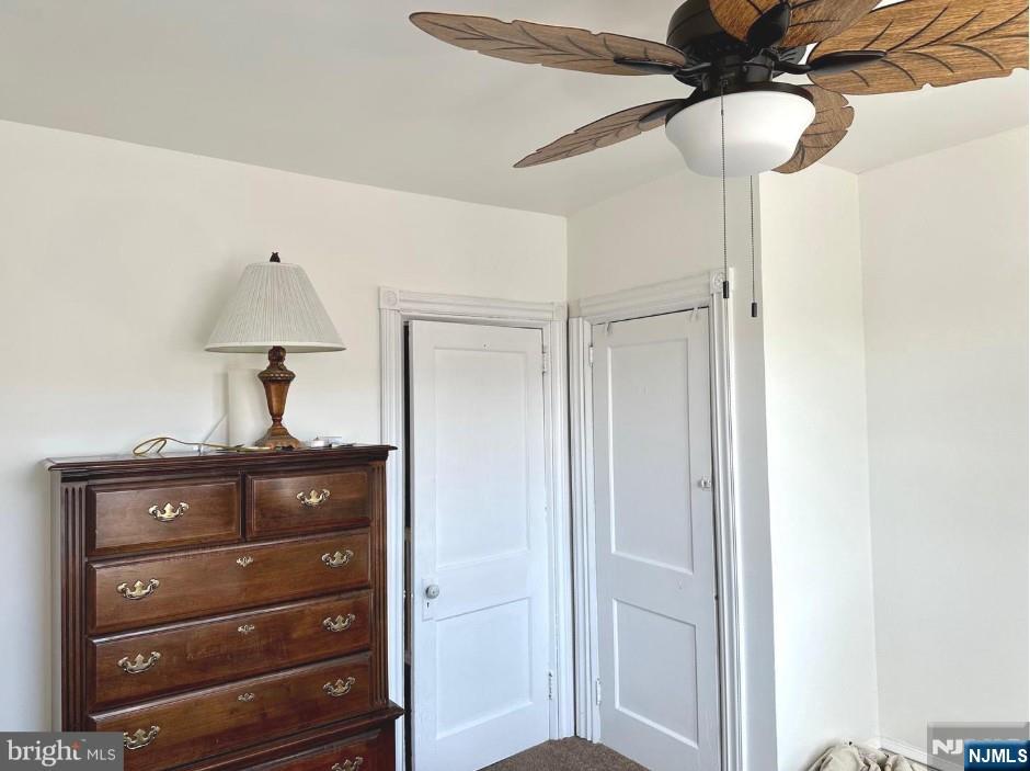 4566 Harding Road Pennsauken, NJ 08109 - Photo 11 of 18 a room with a dresser and a mirror