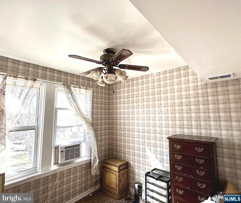 4566 Harding Road Pennsauken, NJ 08109 - Photo 12 of 18 a bathroom with a sink a mirror and a shower