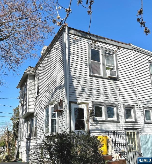 4566 Harding Road Pennsauken, NJ 08109 - Photo 3 of 18 a front view of a house with a garden