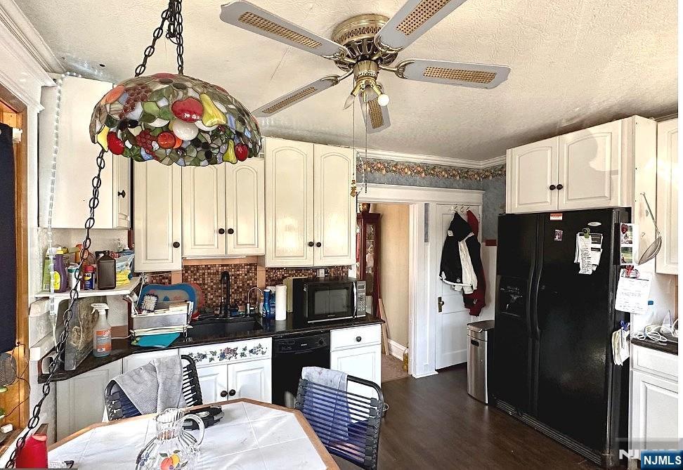 4566 Harding Road Pennsauken, NJ 08109 - Photo 5 of 18 a living room with stainless steel appliances kitchen island granite countertop furniture and a chandelier