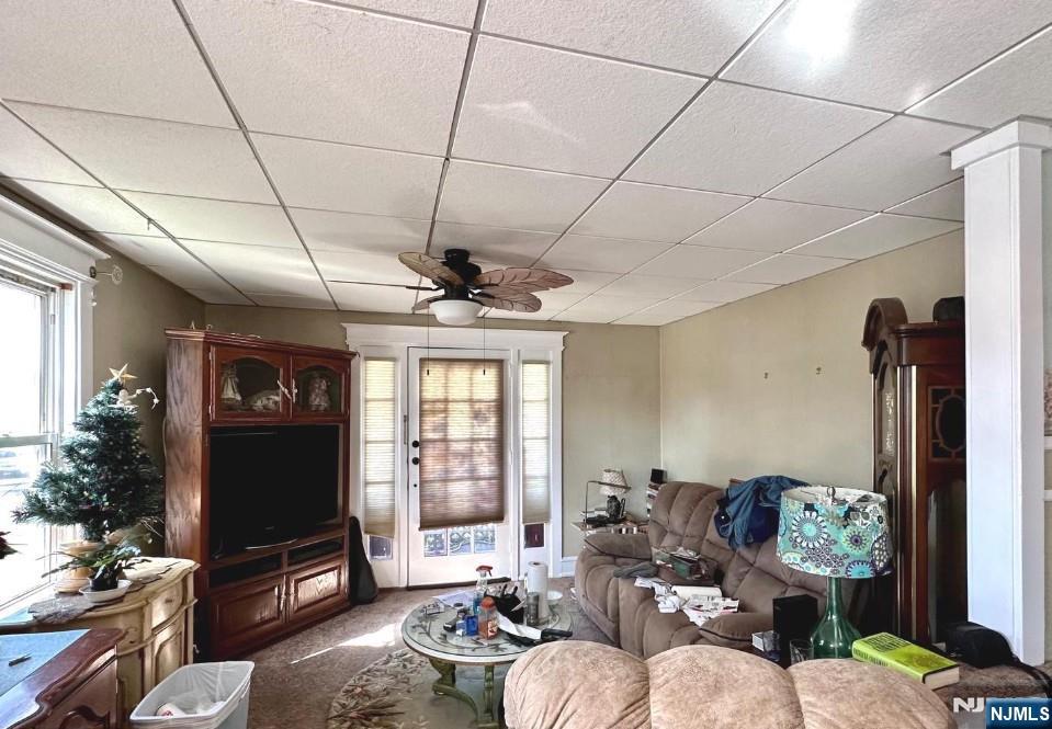 4566 Harding Road Pennsauken, NJ 08109 - Photo 7 of 18 a living room with furniture and a flat screen tv