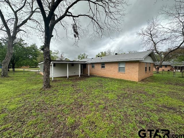 3023 Mistletoe Circle Tyler, TX 75701 - Photo 13 of 14 front view of house with a big yard