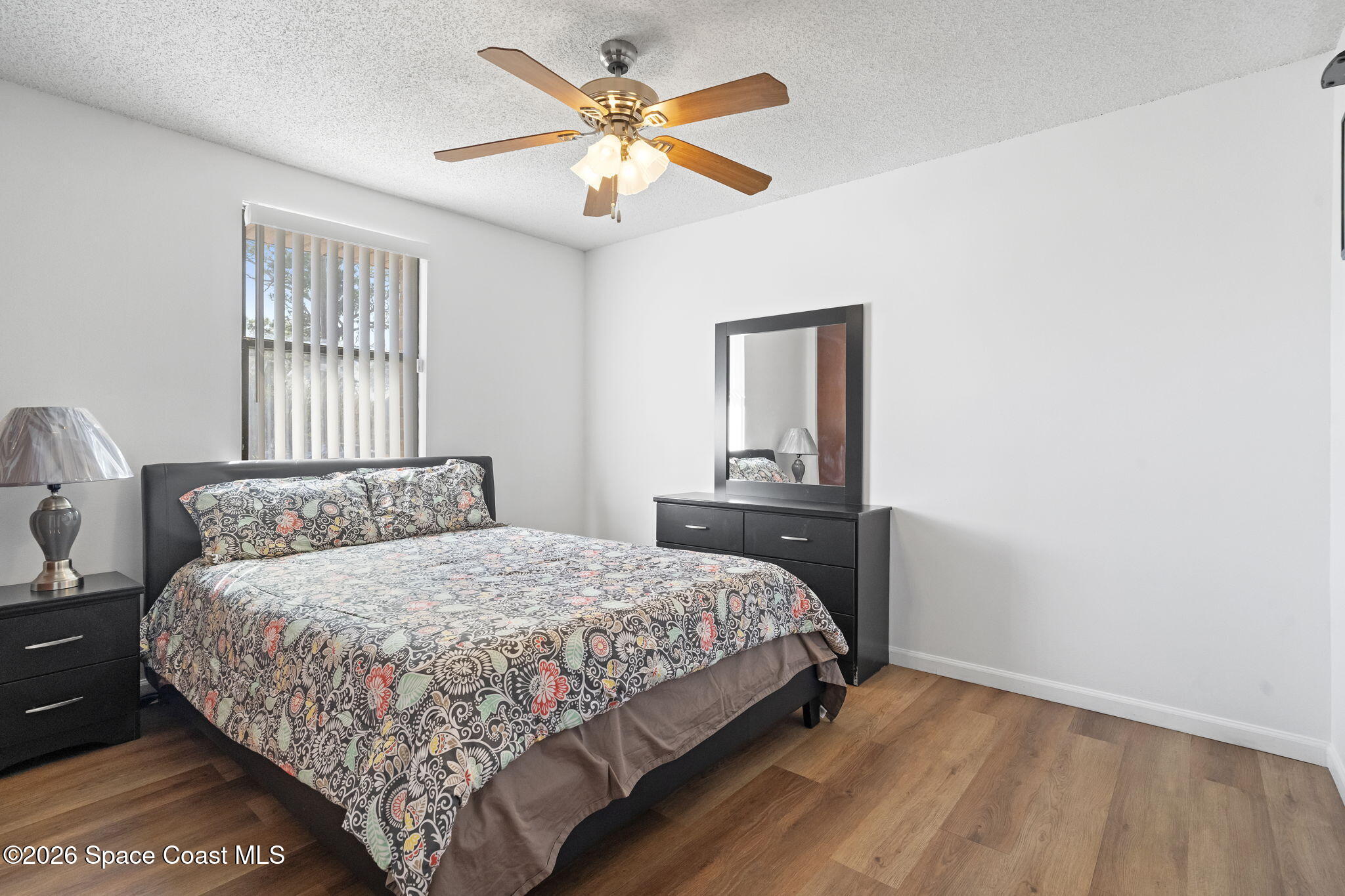 4550 Piedras Street Cocoa, FL 32927 - Photo 26 of 53 a bedroom with a bed and a window