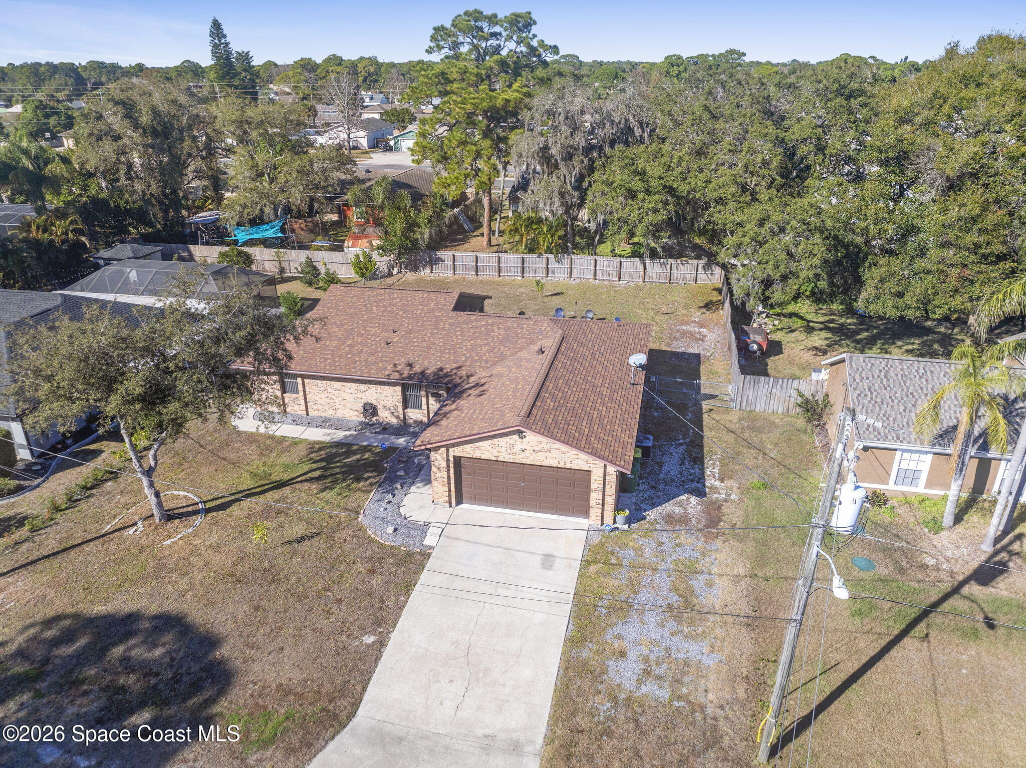 4550 Piedras Street Cocoa, FL 32927 - Photo 46 of 53 a view of a patio with a table and chairs