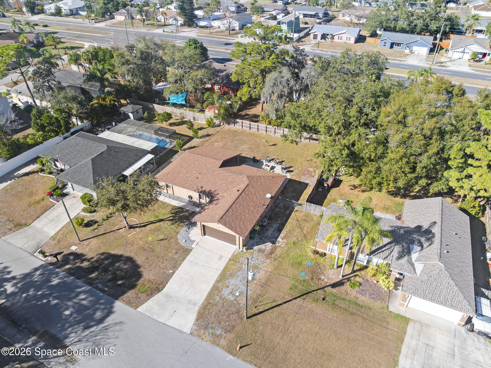 4550 Piedras Street Cocoa, FL 32927 - Photo 50 of 53 an aerial view of residential houses with outdoor space