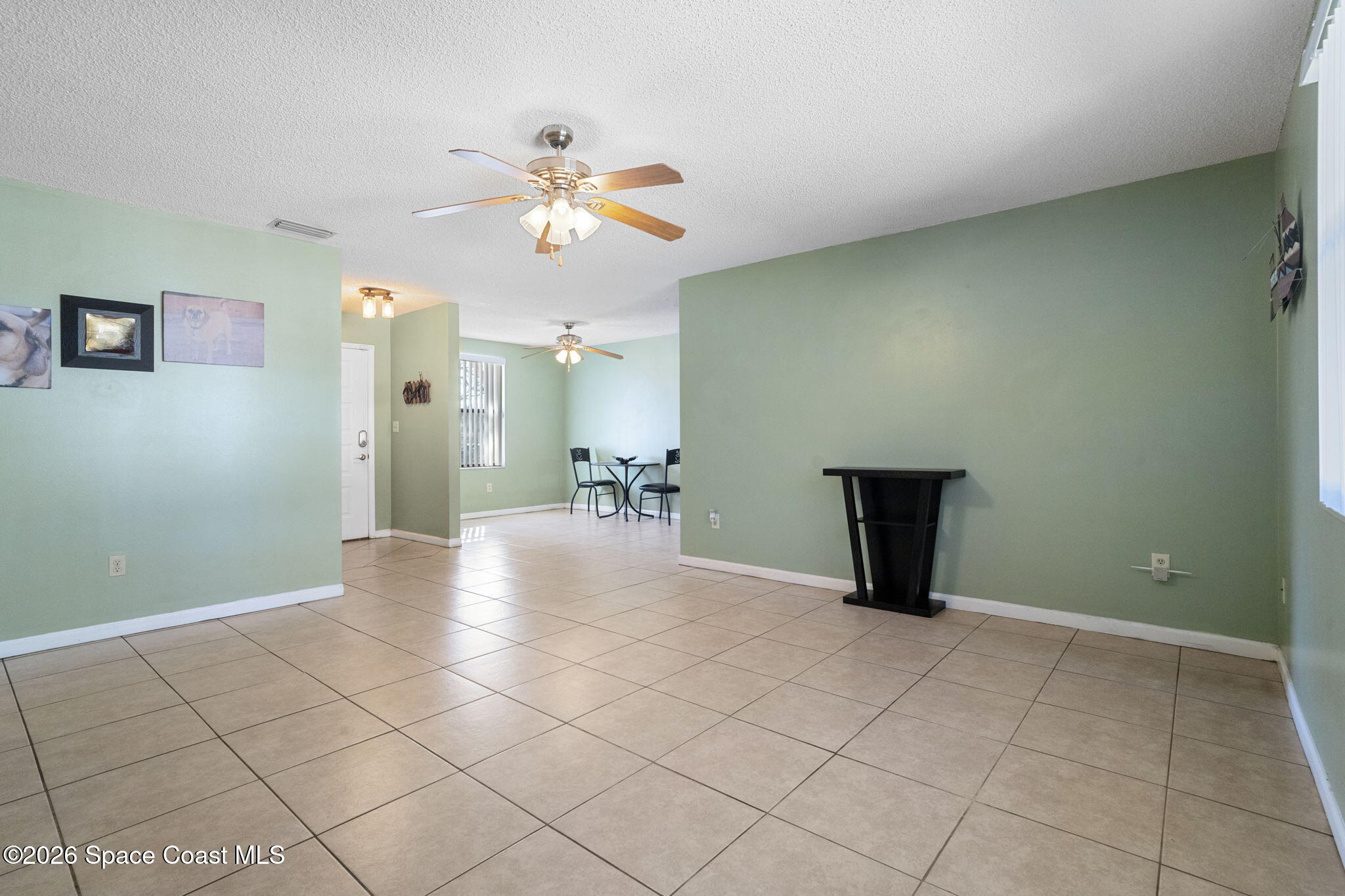 4550 Piedras Street Cocoa, FL 32927 - Photo 6 of 53 a view of an empty room with a window