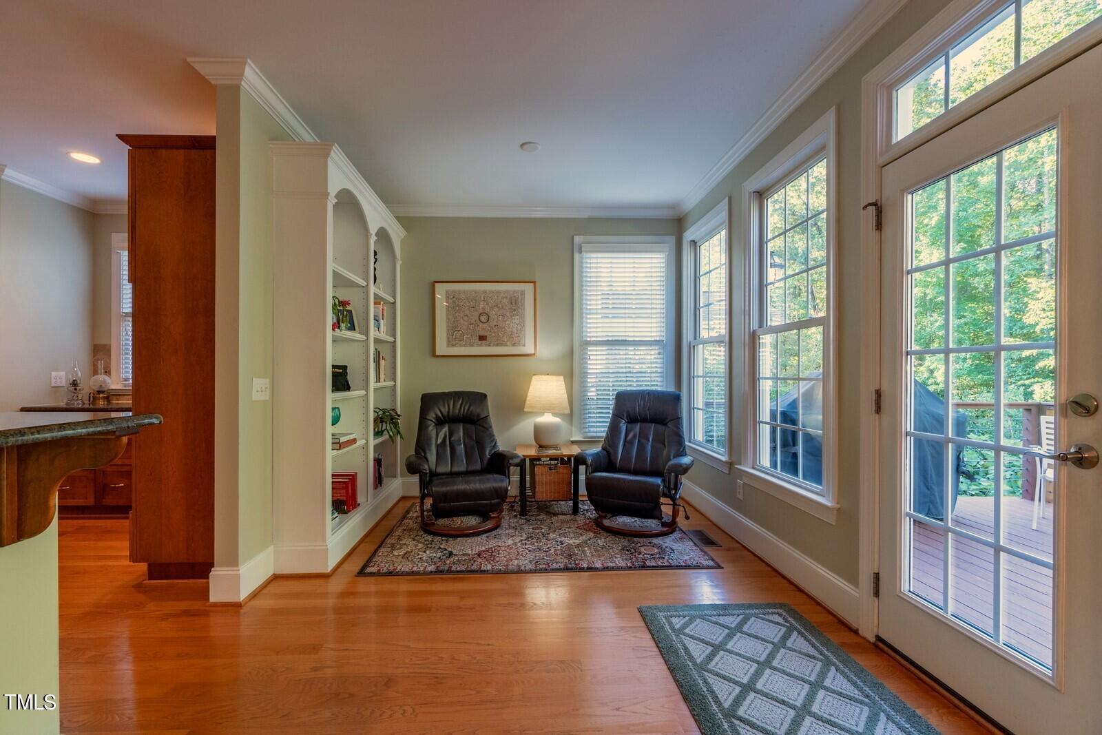 4211 Forest Edge Trail Durham, NC 27705 - Photo 13 of 62 a living room with furniture large window and a table