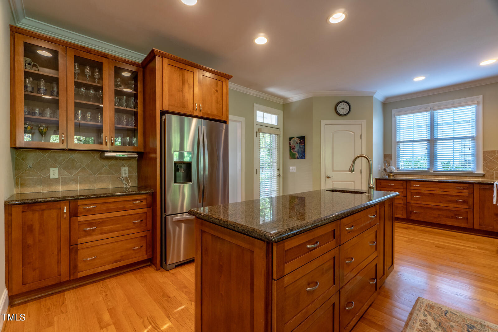 4211 Forest Edge Trail Durham, NC 27705 - Photo 18 of 62 a kitchen with stainless steel appliances granite countertop a stove and a refrigerator