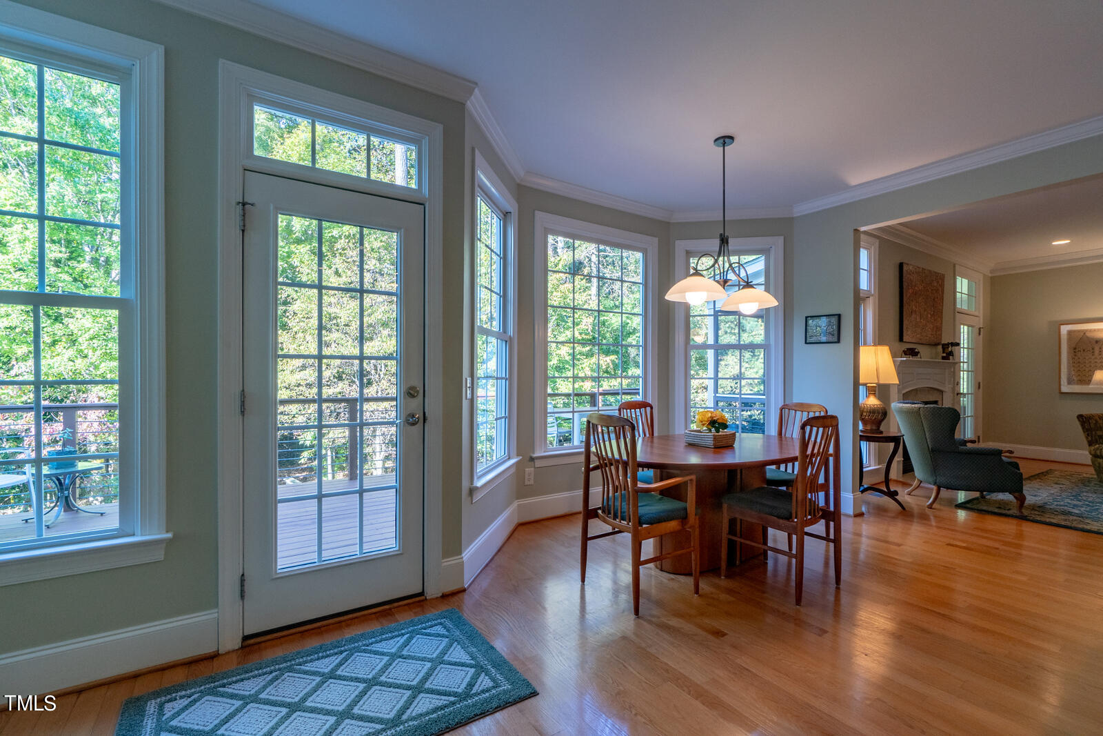 4211 Forest Edge Trail Durham, NC 27705 - Photo 22 of 62 a view of a dining room with furniture window and wooden floor