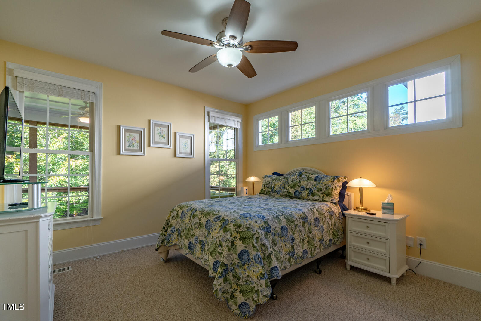 4211 Forest Edge Trail Durham, NC 27705 - Photo 26 of 62 a bedroom with a bed dresser and a window