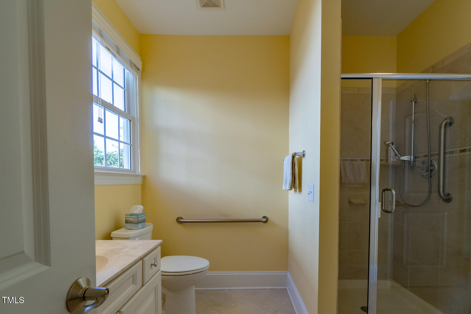 4211 Forest Edge Trail Durham, NC 27705 - Photo 28 of 62 a bathroom with a granite countertop sink toilet and shower
