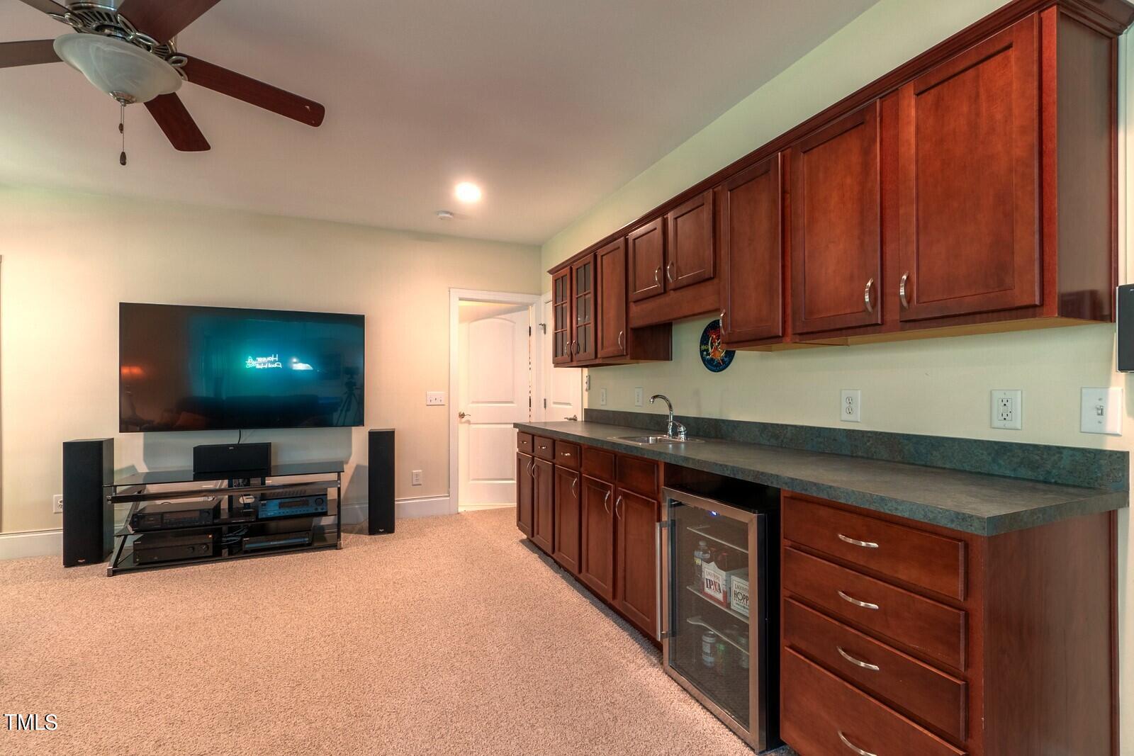 4211 Forest Edge Trail Durham, NC 27705 - Photo 53 of 62 a kitchen with stainless steel appliances granite countertop a sink and a stove top oven