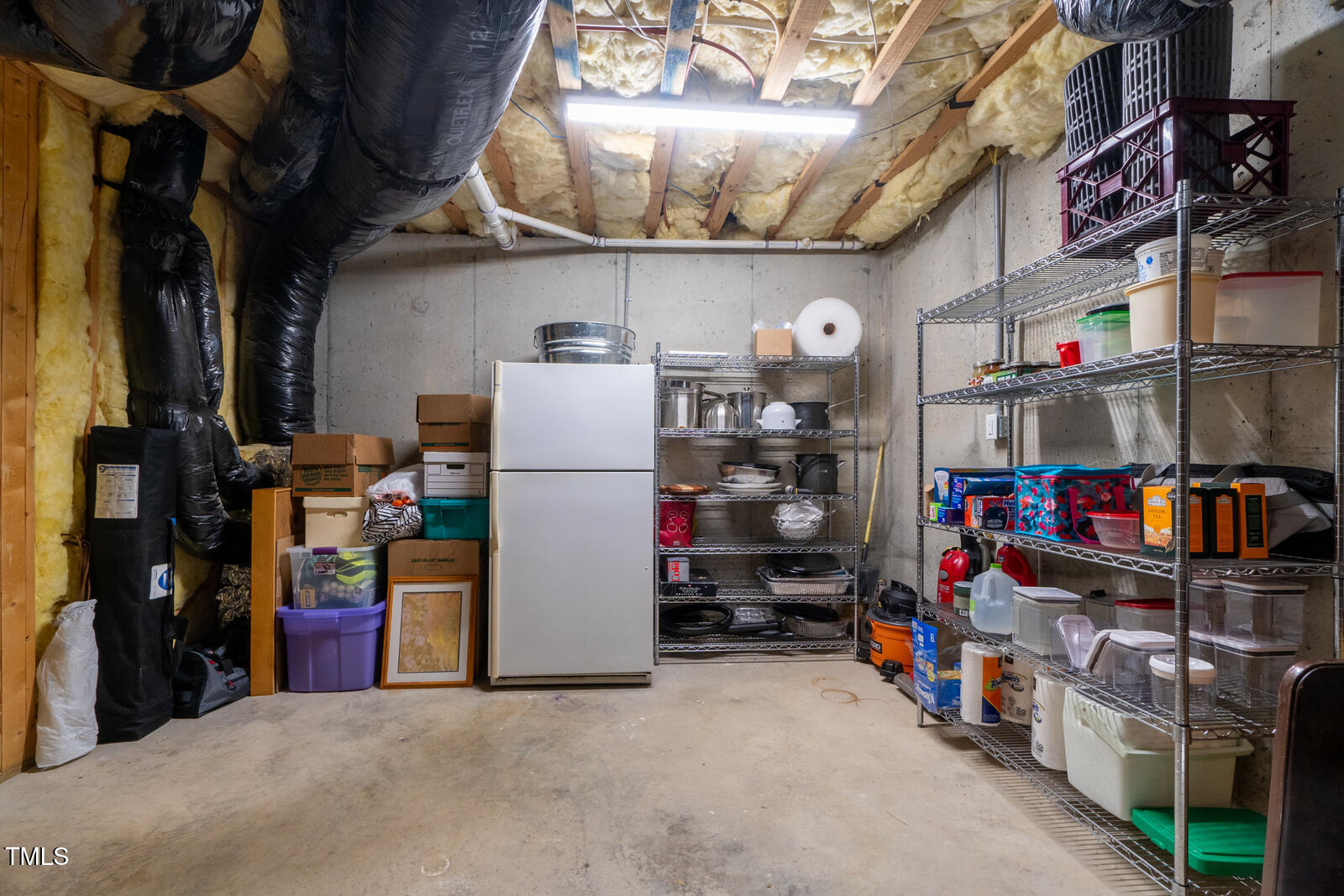 4211 Forest Edge Trail Durham, NC 27705 - Photo 58 of 62 a storage room with washer and dryer