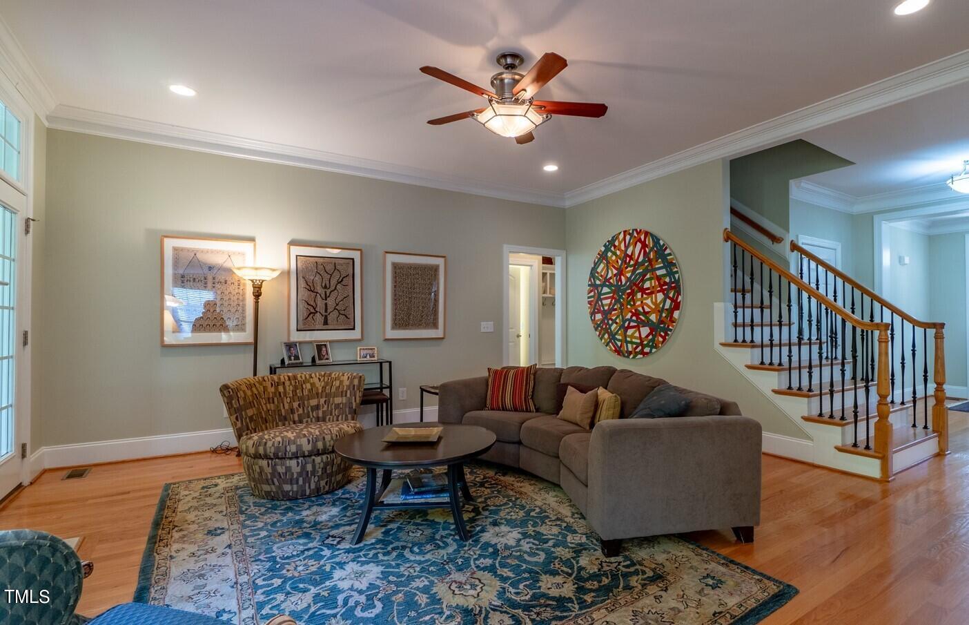 4211 Forest Edge Trail Durham, NC 27705 - Photo 8 of 62 a living room with furniture and a rug