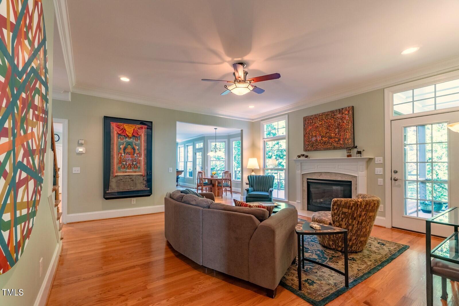 4211 Forest Edge Trail Durham, NC 27705 - Photo 9 of 62 a living room with furniture and a fireplace