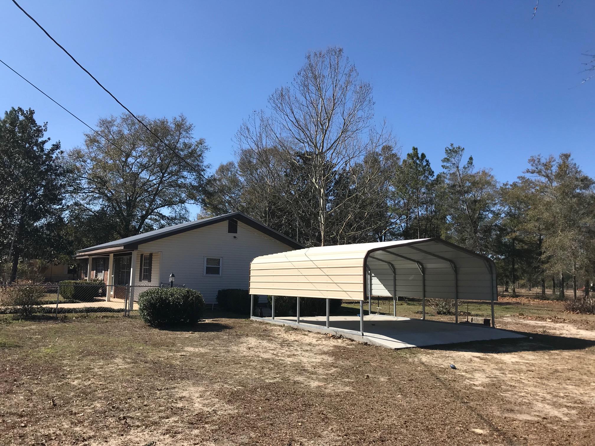 185 Smith Road DeFuniak Springs, FL 32433 - Photo 2 of 13 Totally fenced with Carport