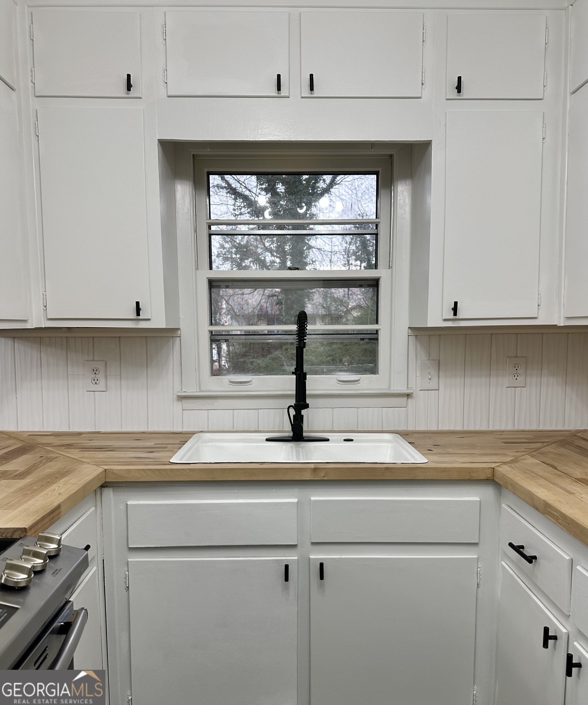 4371 Aldergate Drive Decatur, GA 30035 - Photo 12 of 37 a kitchen with a sink and cabinets