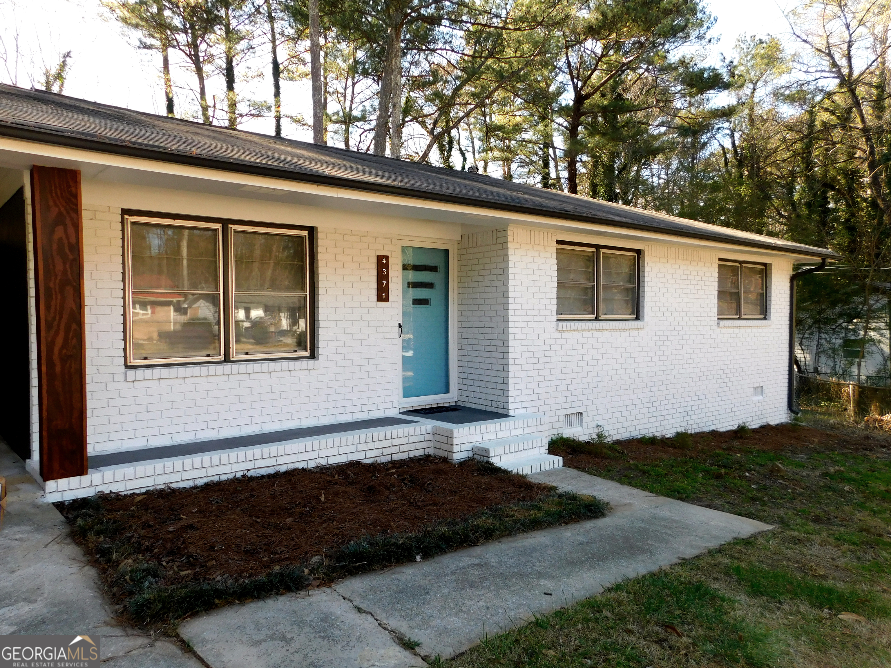 4371 Aldergate Drive Decatur, GA 30035 - Photo 2 of 37 a front view of a house with yard