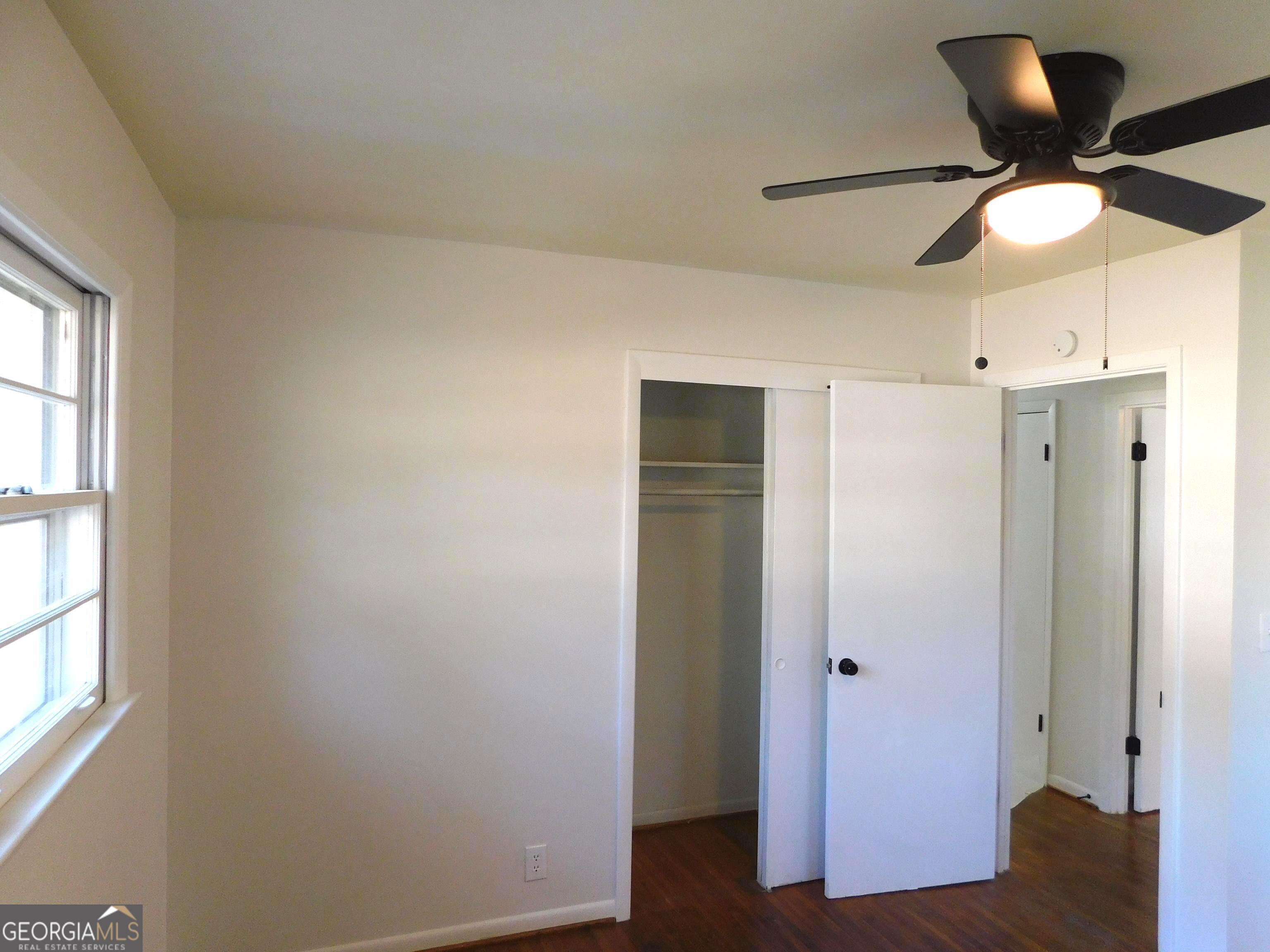 4371 Aldergate Drive Decatur, GA 30035 - Photo 28 of 37 a view of empty room with wooden floor and window