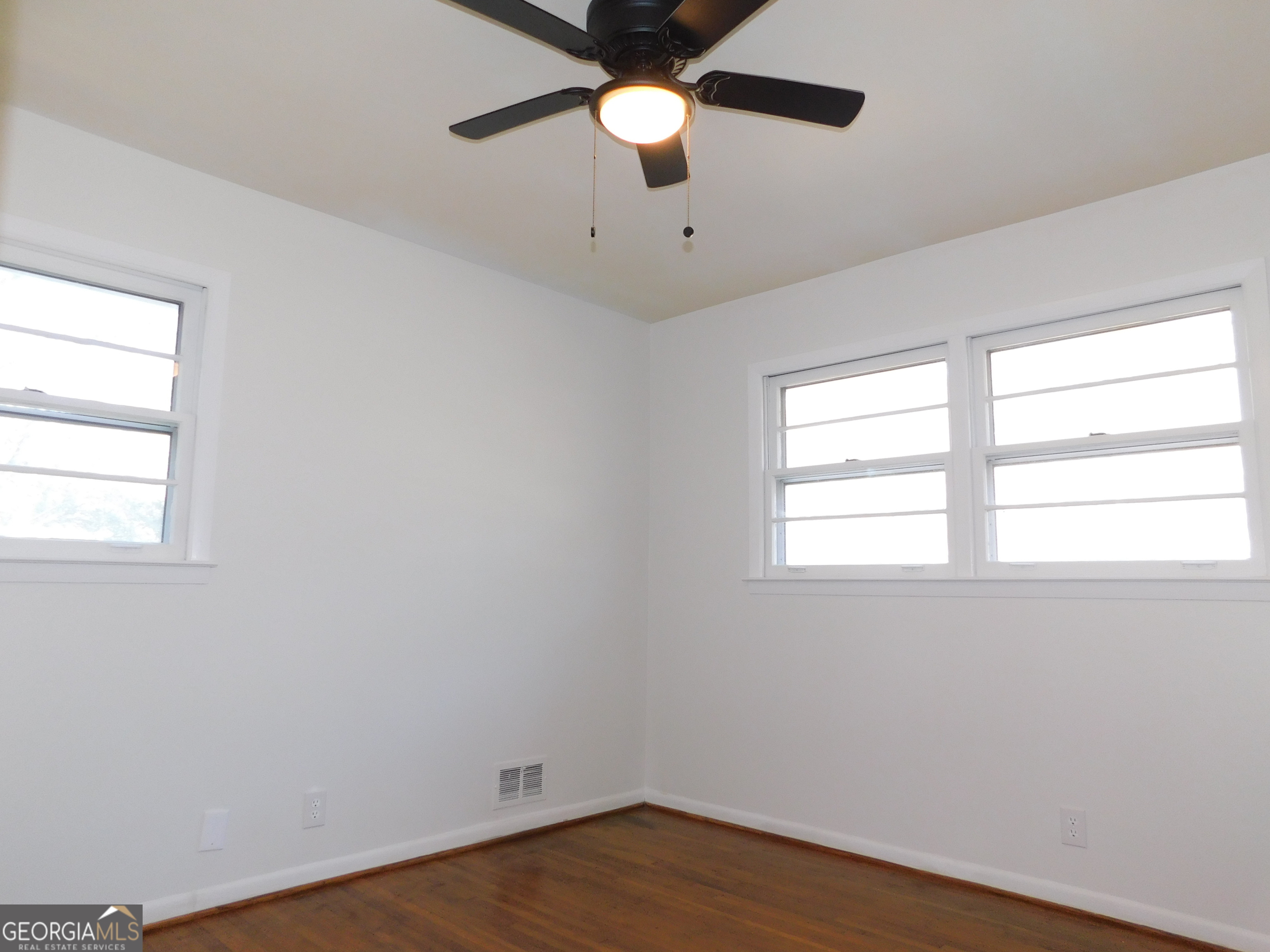 4371 Aldergate Drive Decatur, GA 30035 - Photo 29 of 37 wooden floor in an empty room with a window