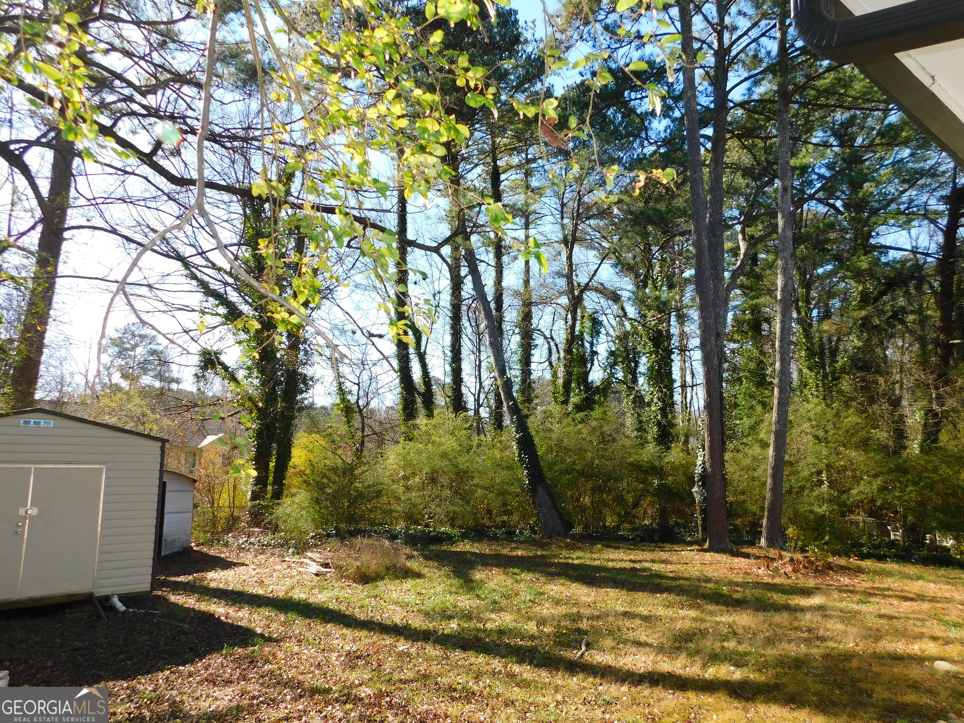 4371 Aldergate Drive Decatur, GA 30035 - Photo 36 of 37 a view of a backyard with large trees