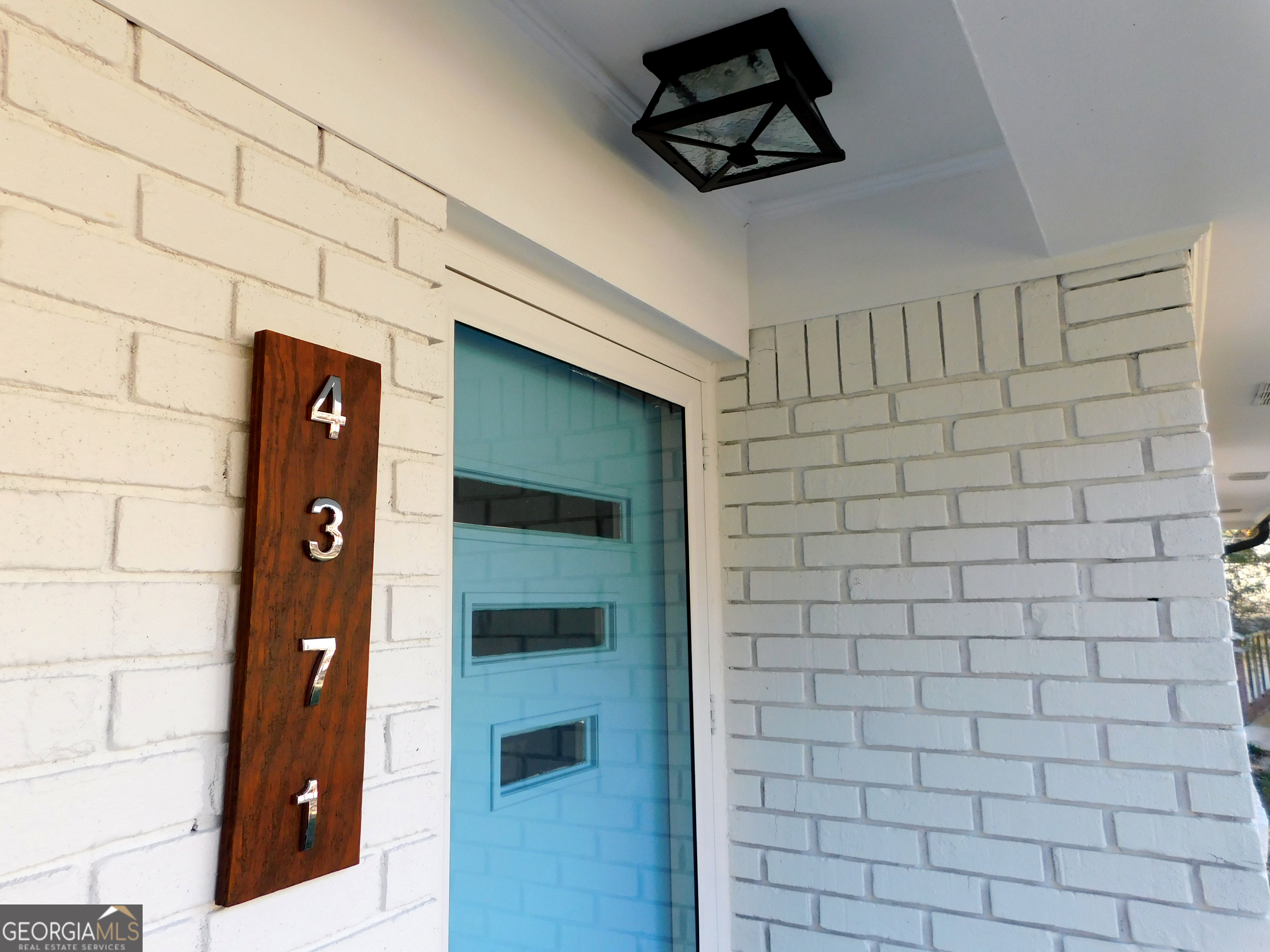 4371 Aldergate Drive Decatur, GA 30035 - Photo 5 of 37 a bathroom with a shower and a sink