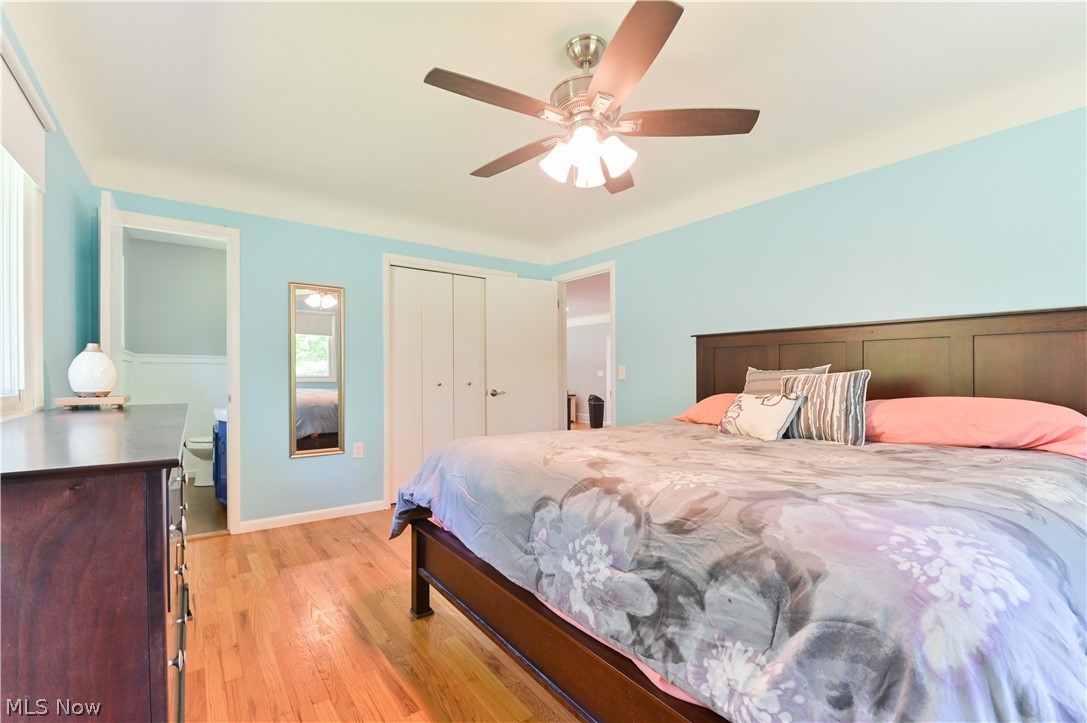 2725 Rockefeller Road Willoughby Hills, OH 44092 - Photo 9 of 21 Bedroom with a closet, ceiling fan, and light hardwood / wood-style flooring