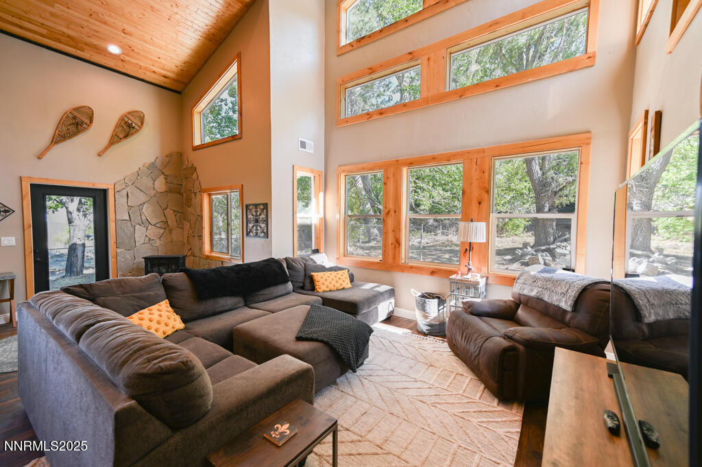 1147 Autumn Hills Road Gardnerville, NV 89460 - Photo 7 of 53 a living room with furniture and large windows