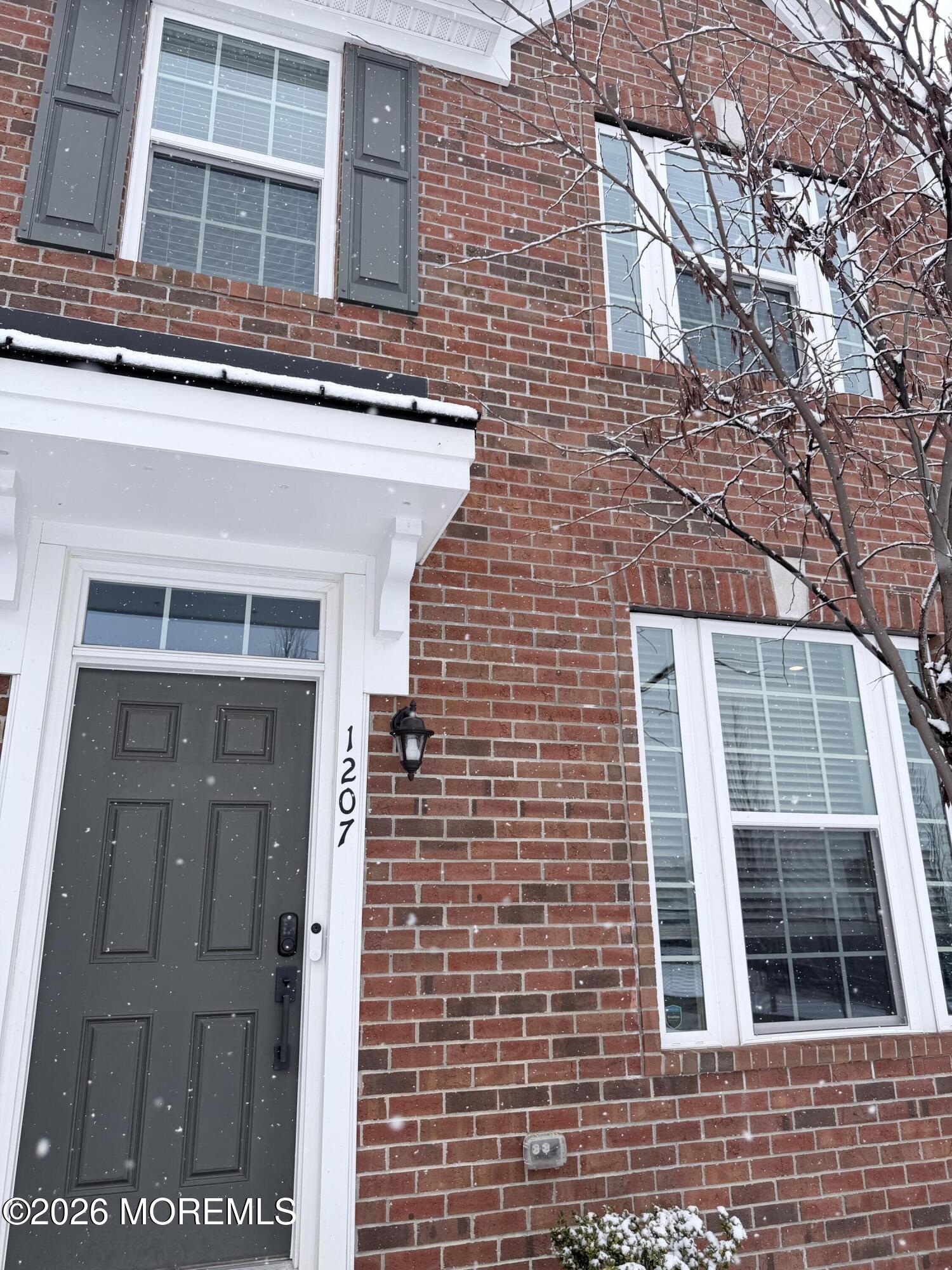 1207 English Lane, Unit 1207 Parlin, NJ 08859 - Photo 2 of 56 a view of front door of house