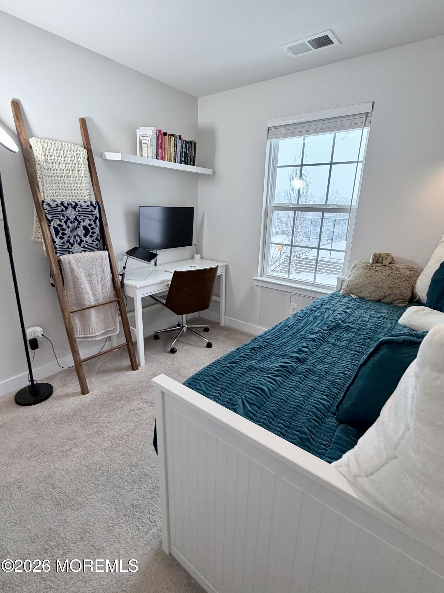 1207 English Lane, Unit 1207 Parlin, NJ 08859 - Photo 30 of 56 a living room with furniture and a flat screen tv