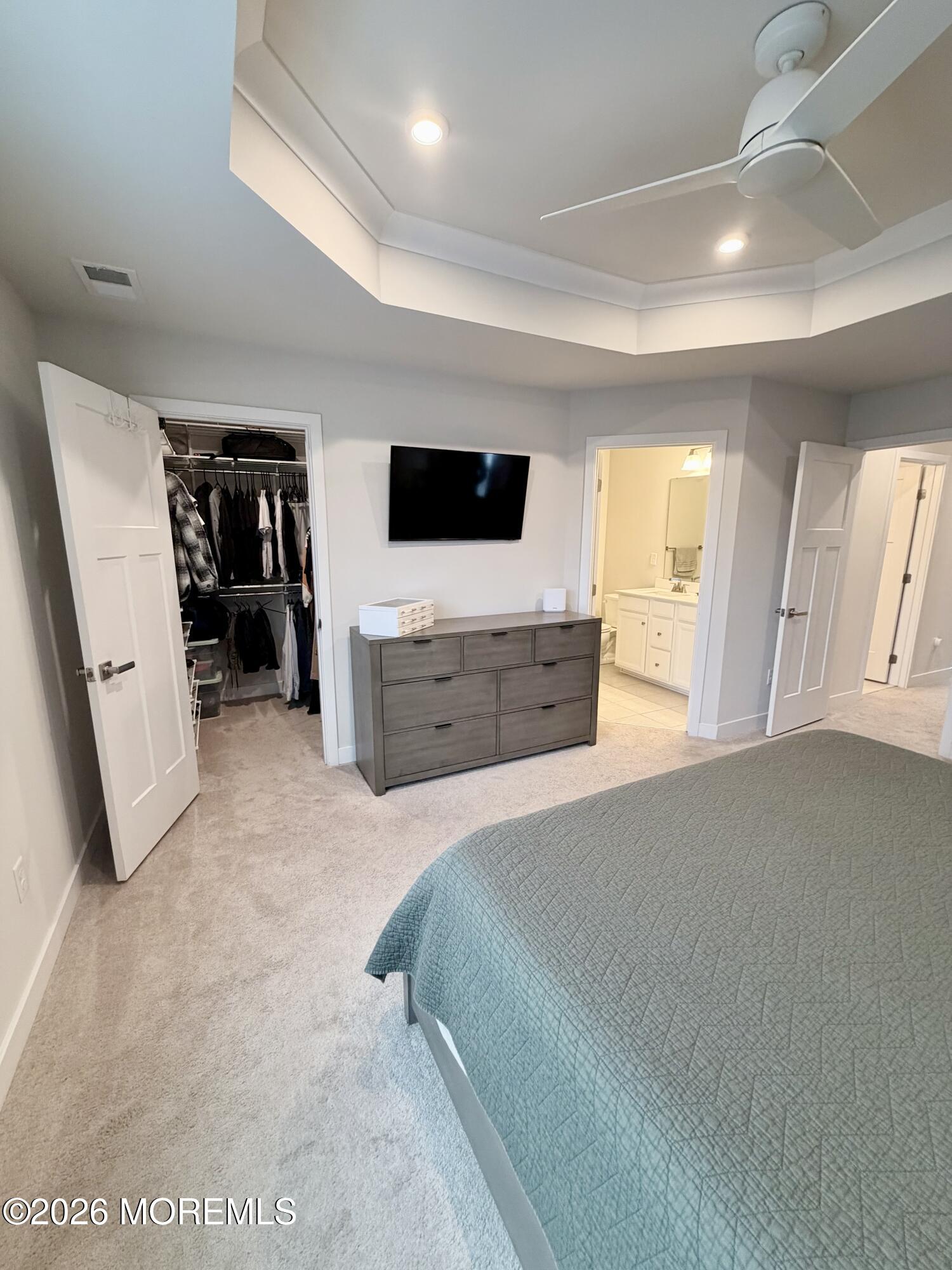 1207 English Lane, Unit 1207 Parlin, NJ 08859 - Photo 36 of 56 a living room with furniture and a flat screen tv