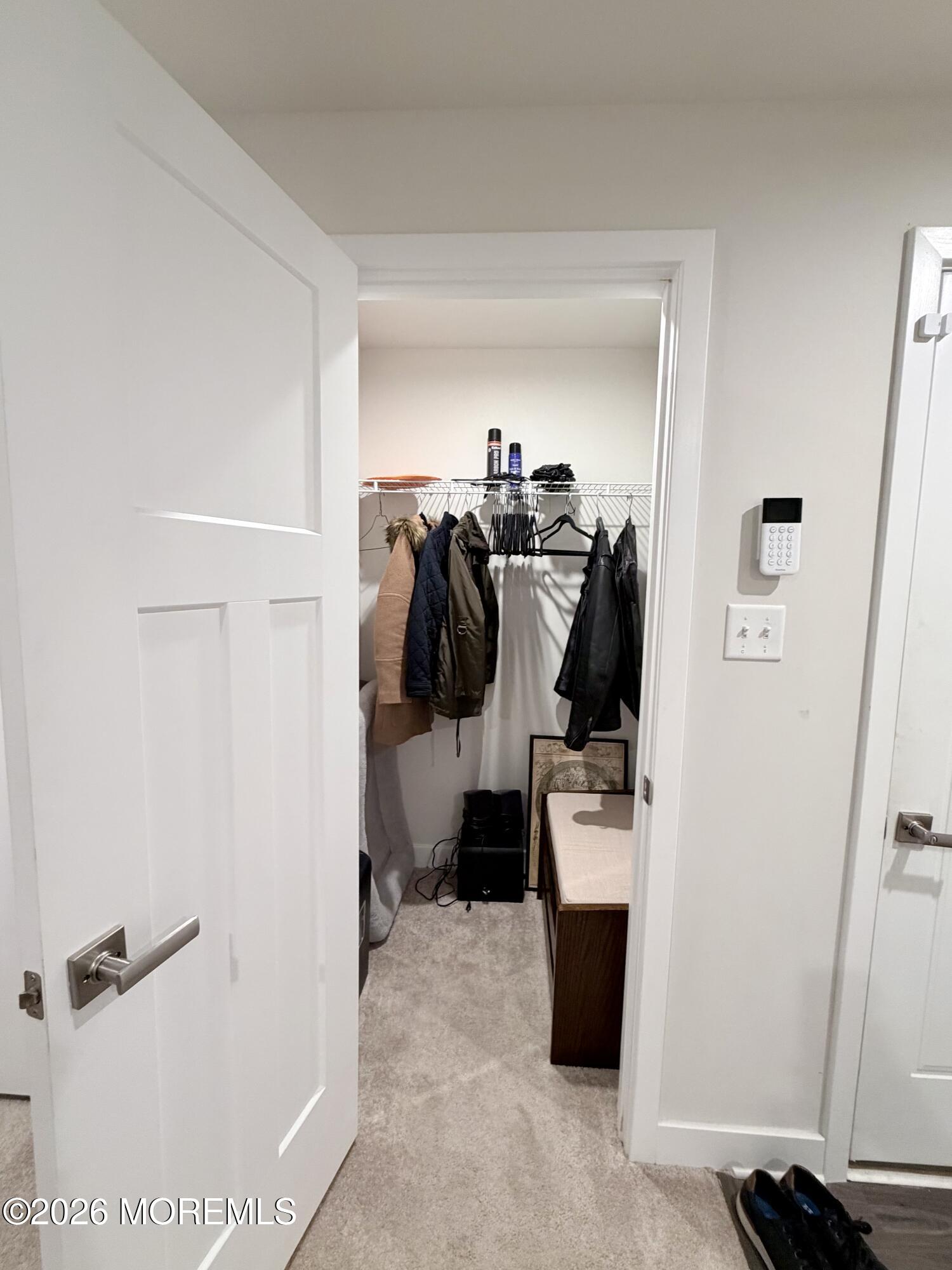 1207 English Lane, Unit 1207 Parlin, NJ 08859 - Photo 46 of 56 a view of walk in closet with clothes and shoes