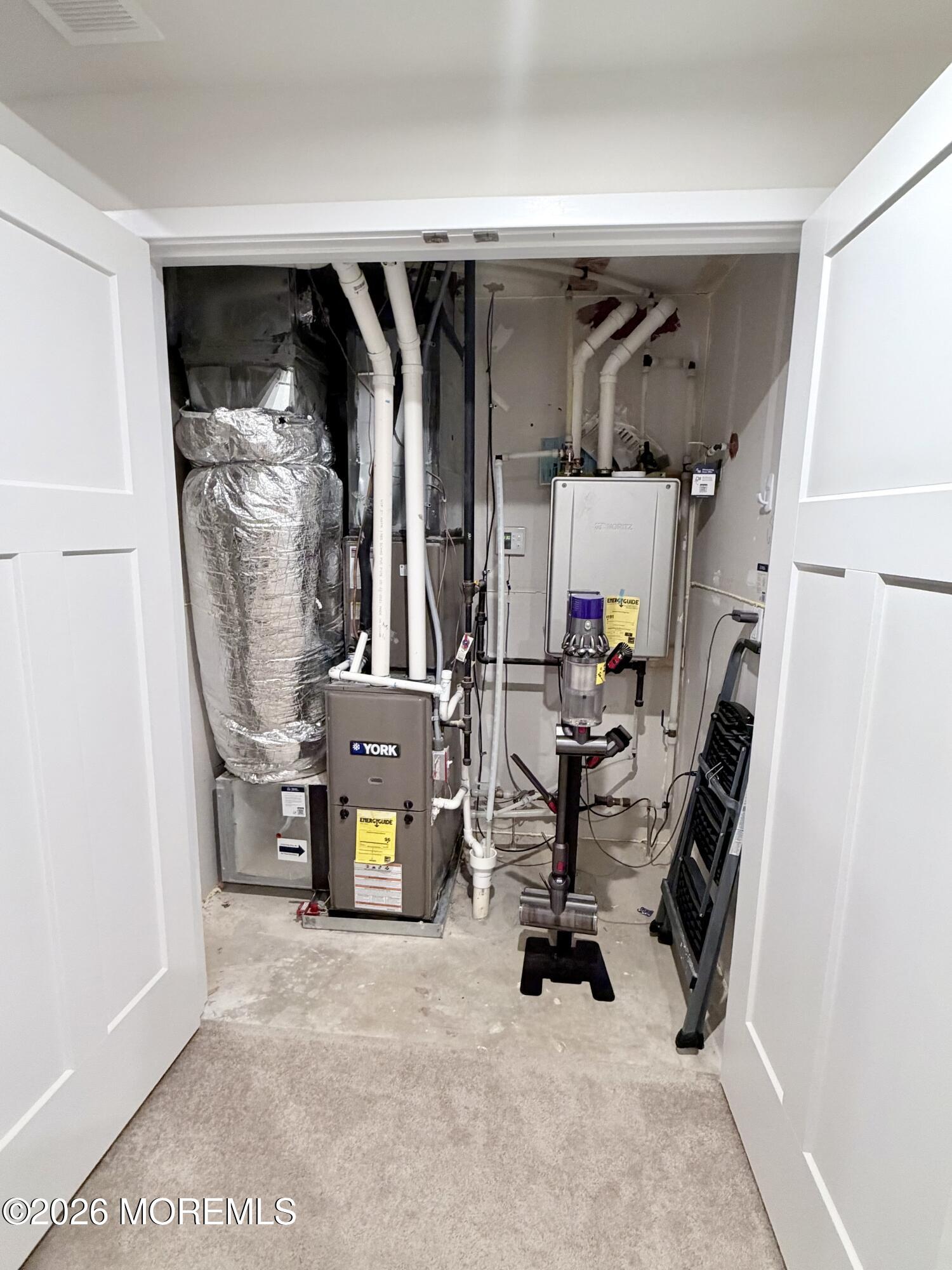 1207 English Lane, Unit 1207 Parlin, NJ 08859 - Photo 48 of 56 a view of walk in closet with clothes and shoes