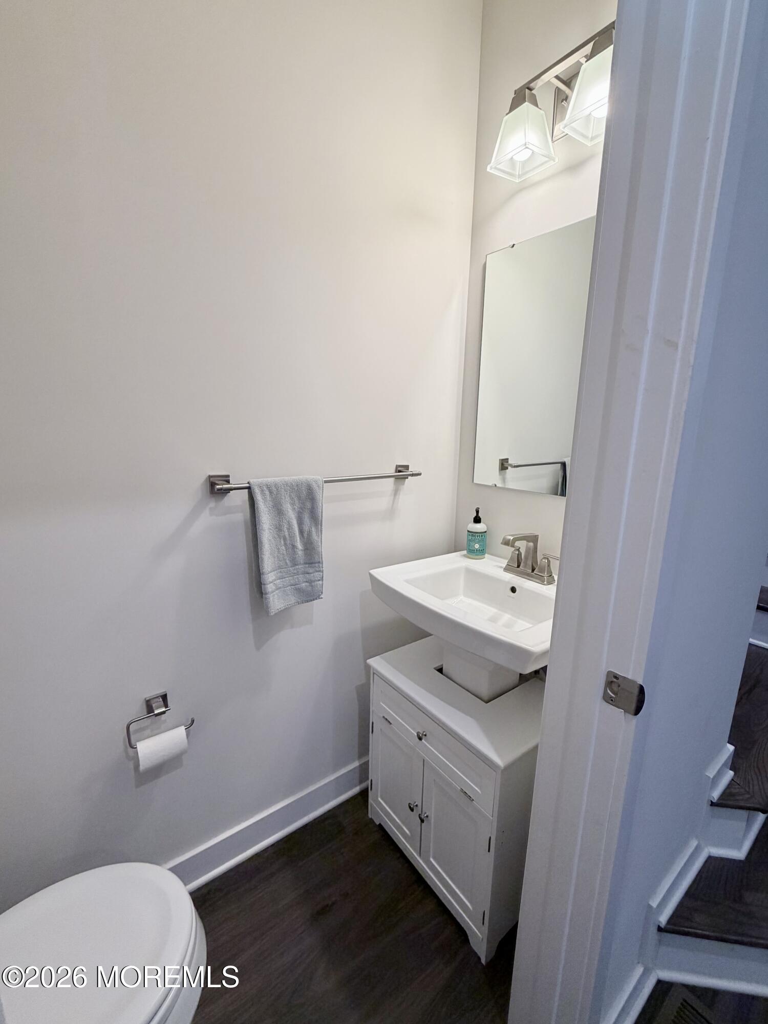 1207 English Lane, Unit 1207 Parlin, NJ 08859 - Photo 8 of 56 a bathroom with a double vanity sink and mirror