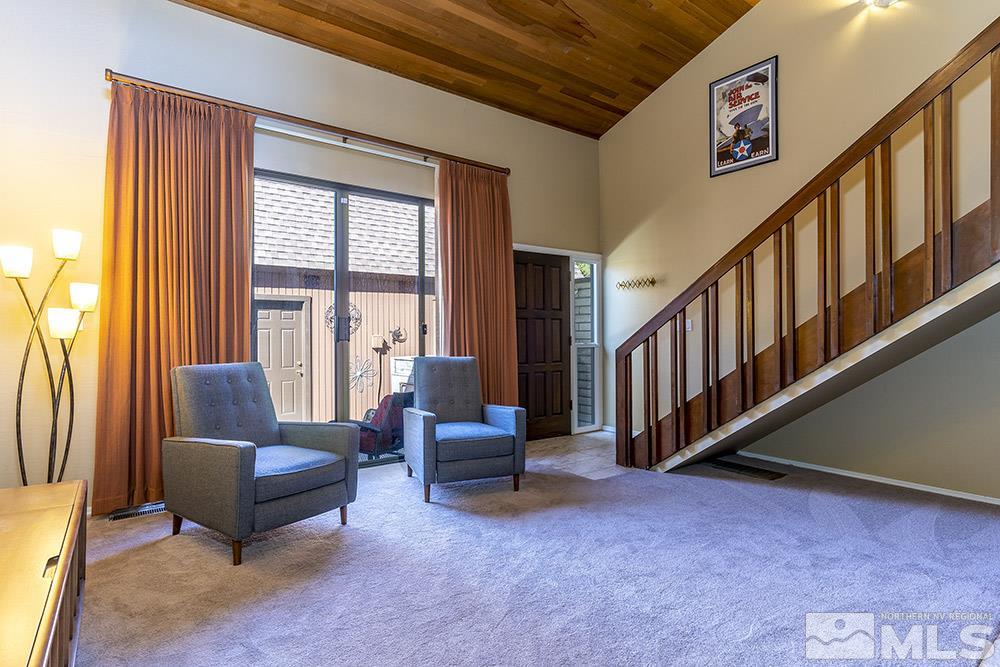 1860 Villa Way Reno, NV 89509 - Photo 3 of 21 a living room with furniture and a floor to ceiling window