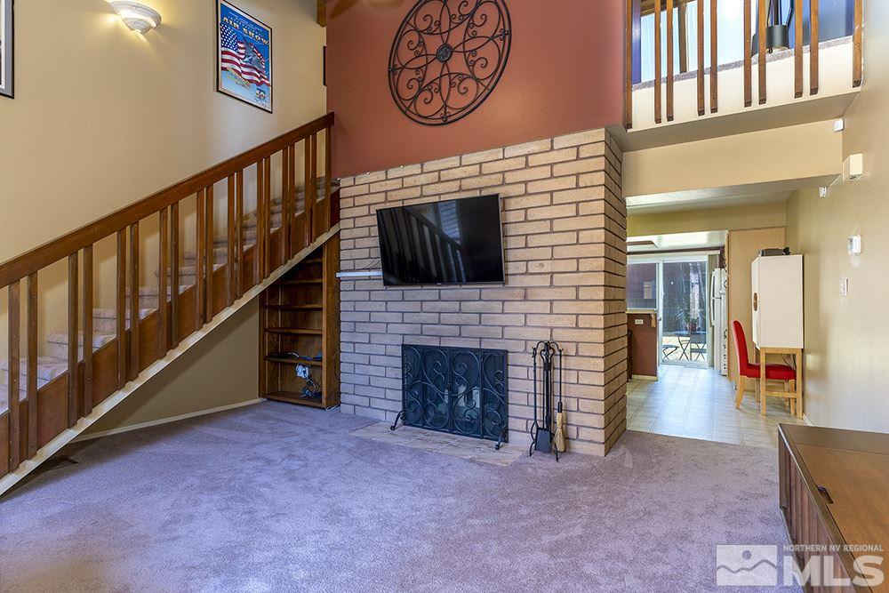 1860 Villa Way Reno, NV 89509 - Photo 4 of 21 a view of an entryway with a fireplace