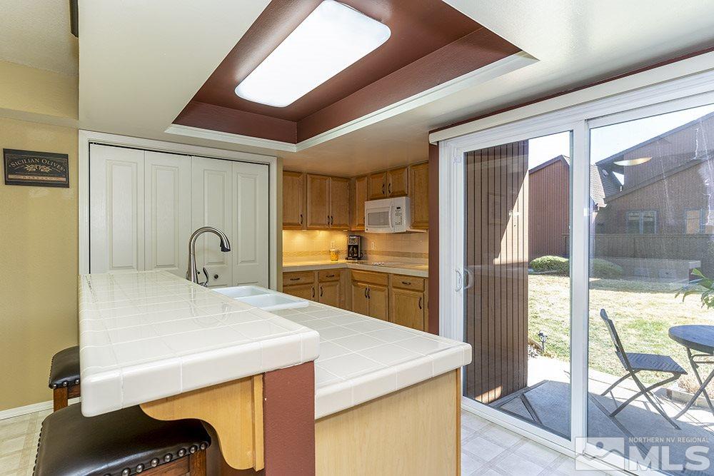 1860 Villa Way Reno, NV 89509 - Photo 8 of 21 a kitchen with sink and view