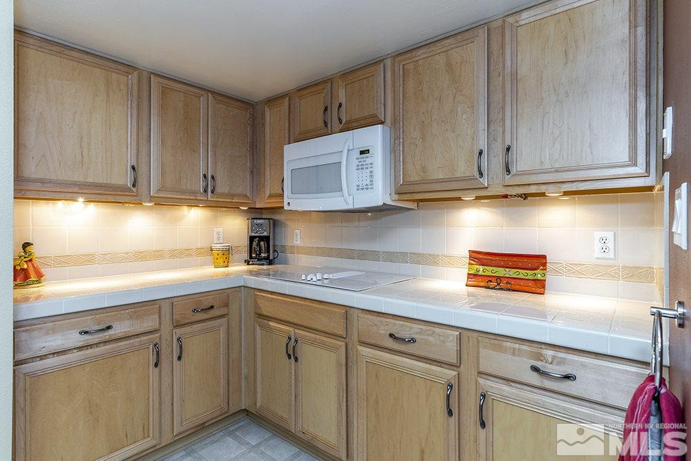 1860 Villa Way Reno, NV 89509 - Photo 10 of 21 a kitchen with cabinets appliances and a sink