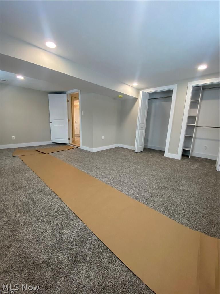 2803 State Road Vermilion, OH 44089 - Photo 15 of 28 Main first floor bedroom featuring brand new carpet carpet, his/hers closet and recessed lighting.