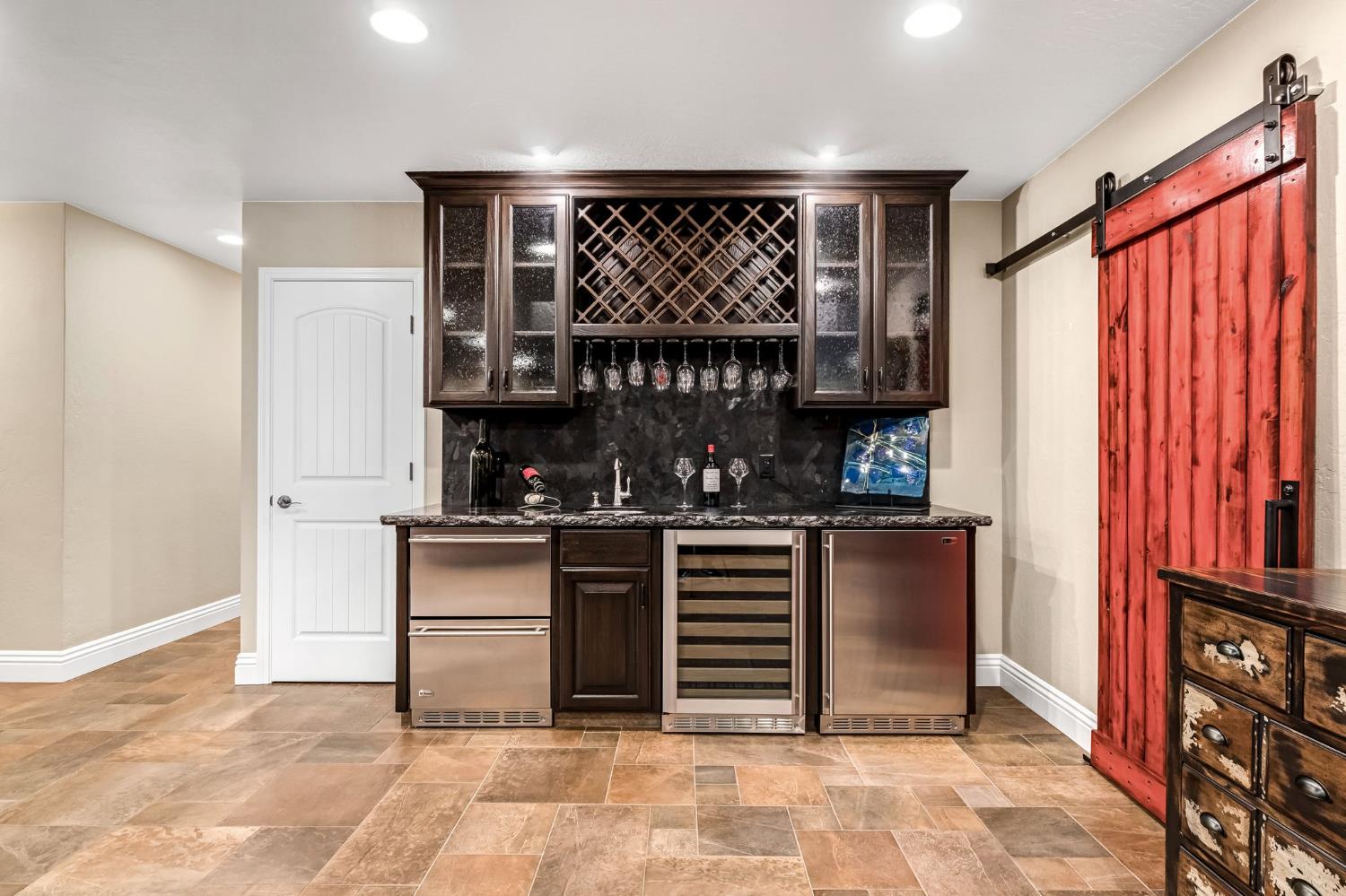 505 Ash Street Lemoore, CA 93245 - Photo 12 of 66 a view of kitchen with furniture and electronic appliances