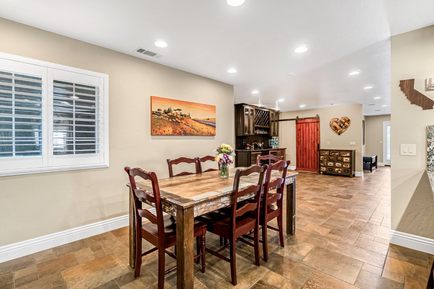 505 Ash Street Lemoore, CA 93245 - Photo 15 of 66 a view of a dining room with furniture