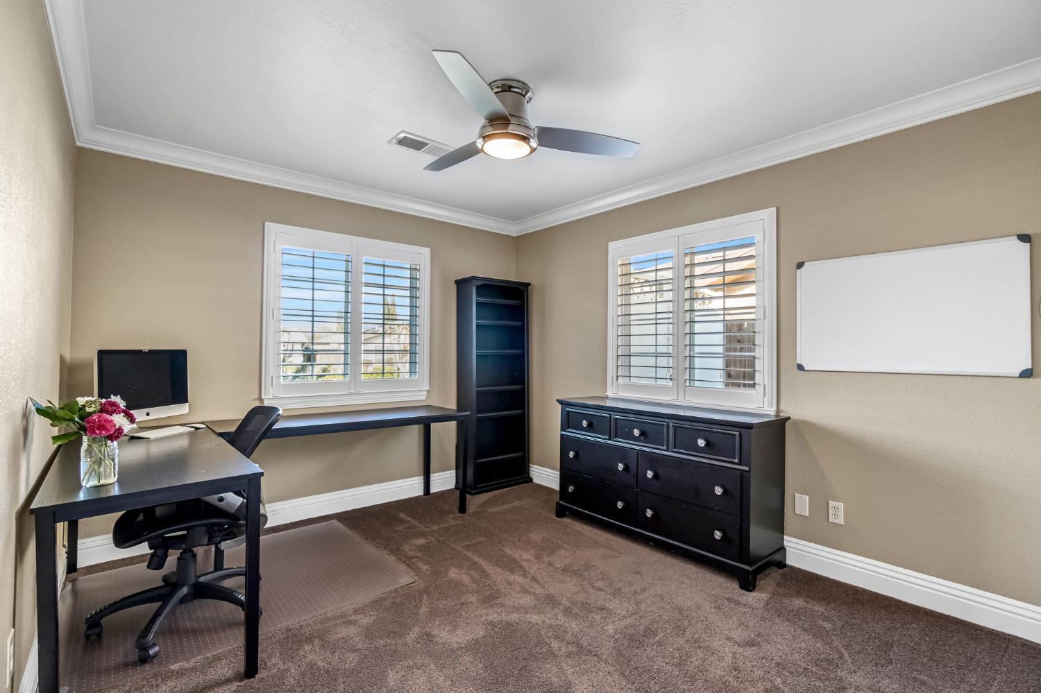 505 Ash Street Lemoore, CA 93245 - Photo 23 of 66 a living room with furniture and a window