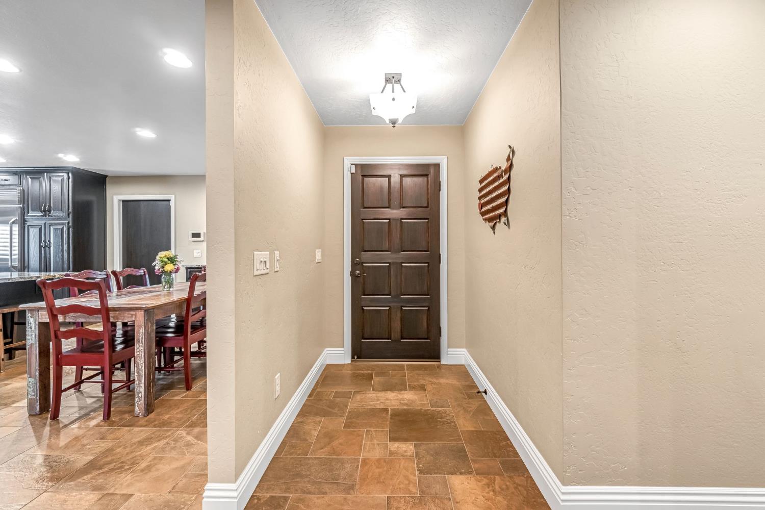 505 Ash Street Lemoore, CA 93245 - Photo 3 of 66 a bathroom with a sink and a mirror