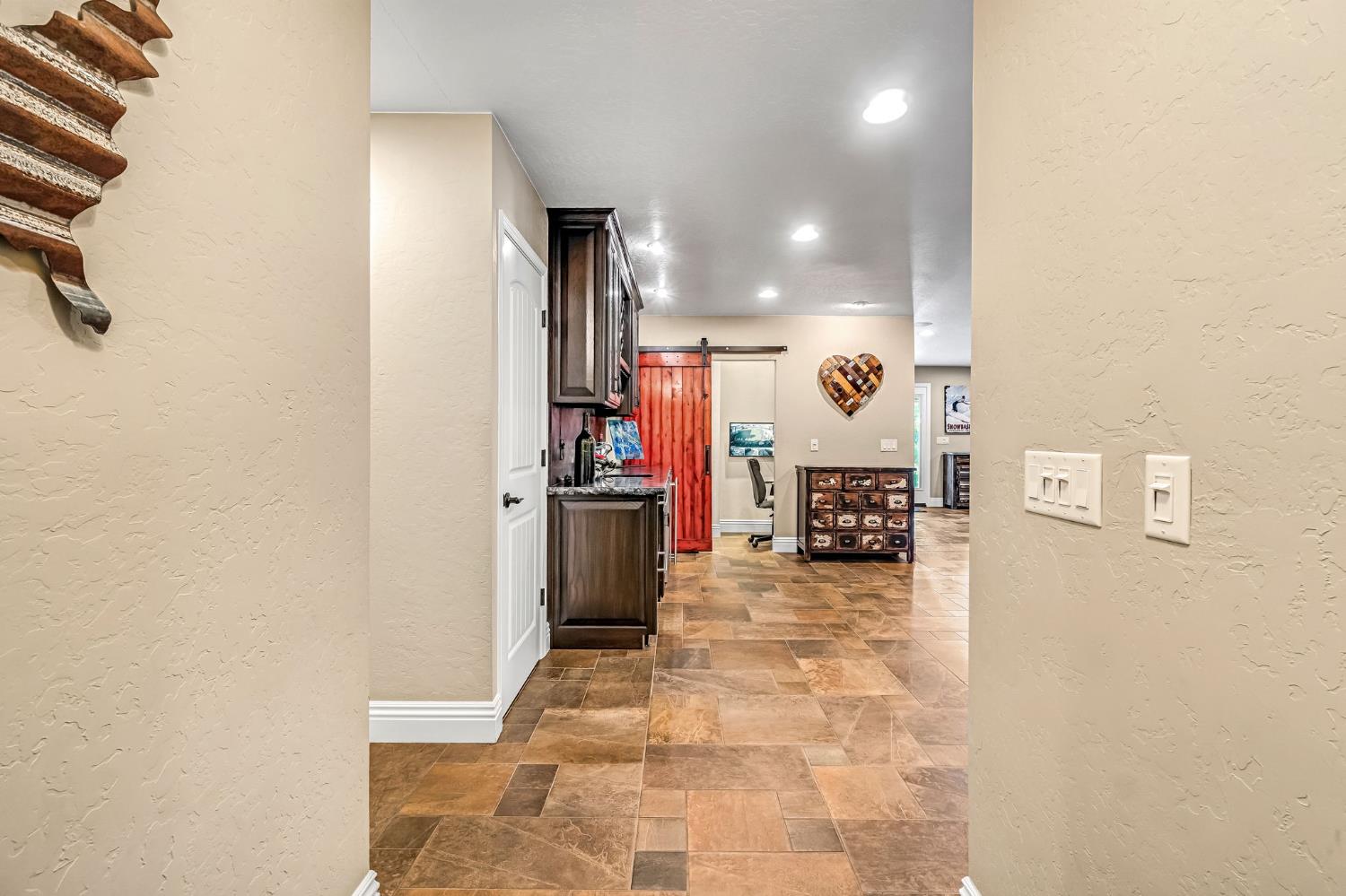 505 Ash Street Lemoore, CA 93245 - Photo 4 of 66 a view of a living room with a fireplace
