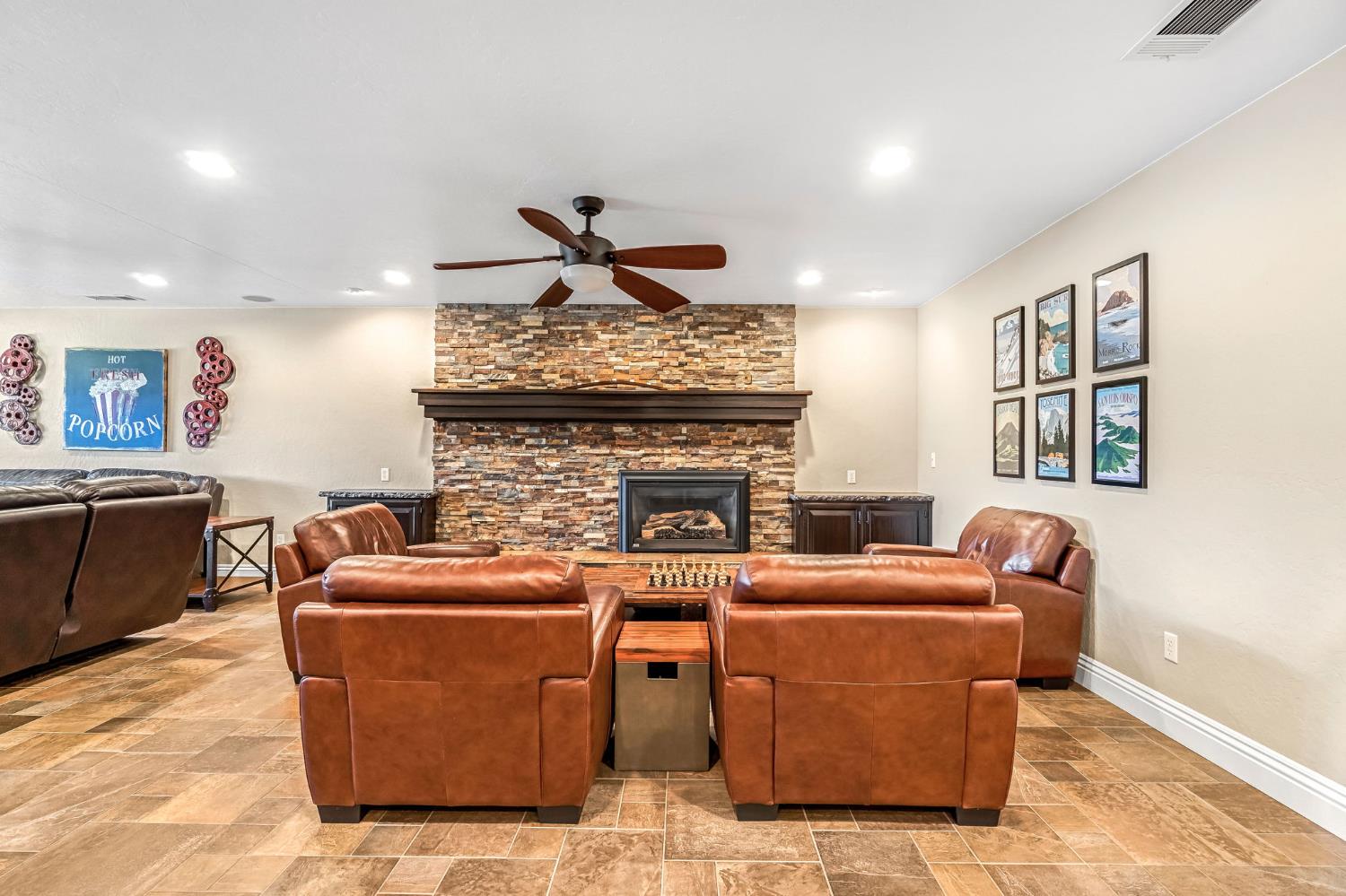 505 Ash Street Lemoore, CA 93245 - Photo 6 of 66 a living room with furniture and a fireplace